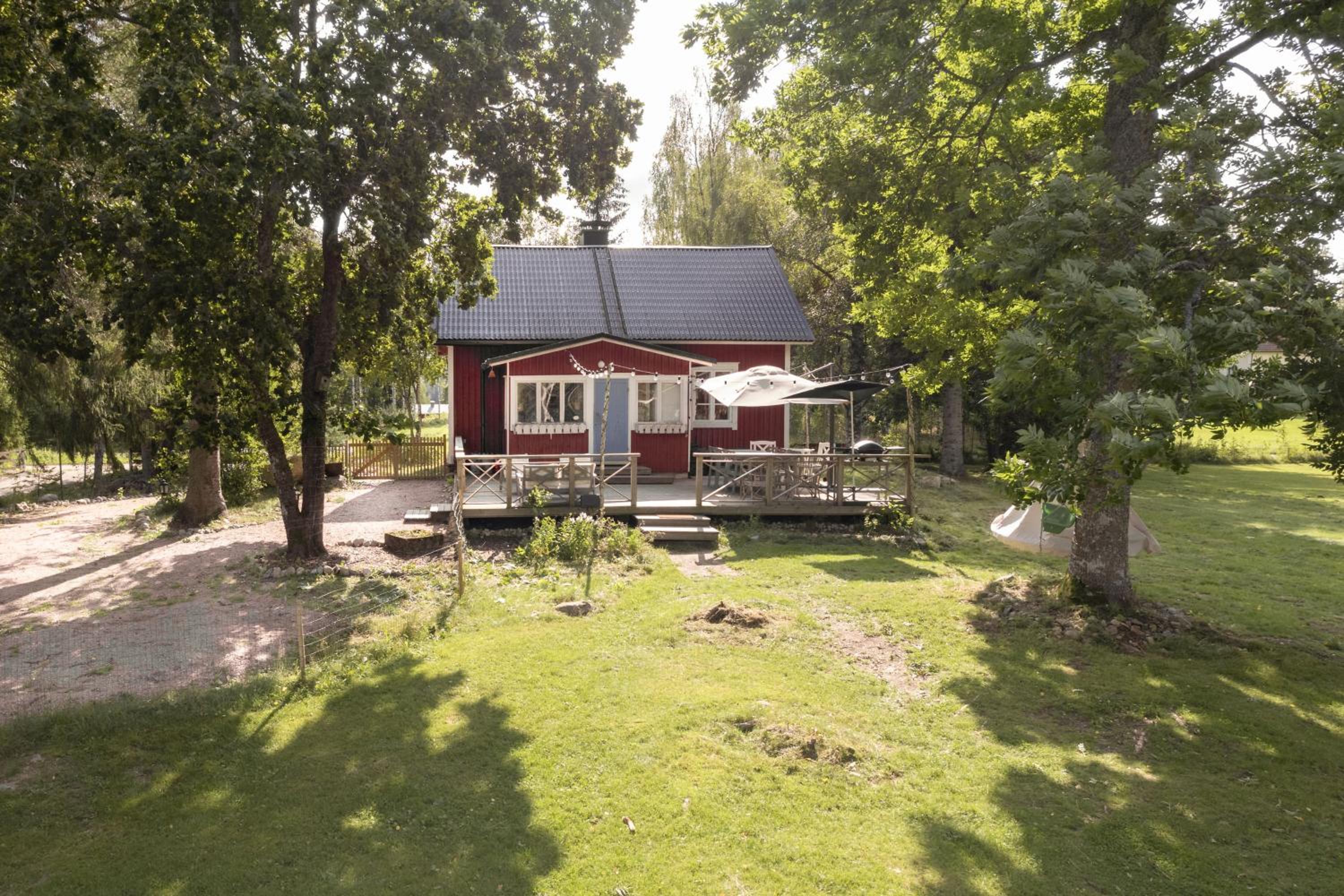 Beautifully renovated lakeside red cottage view 3