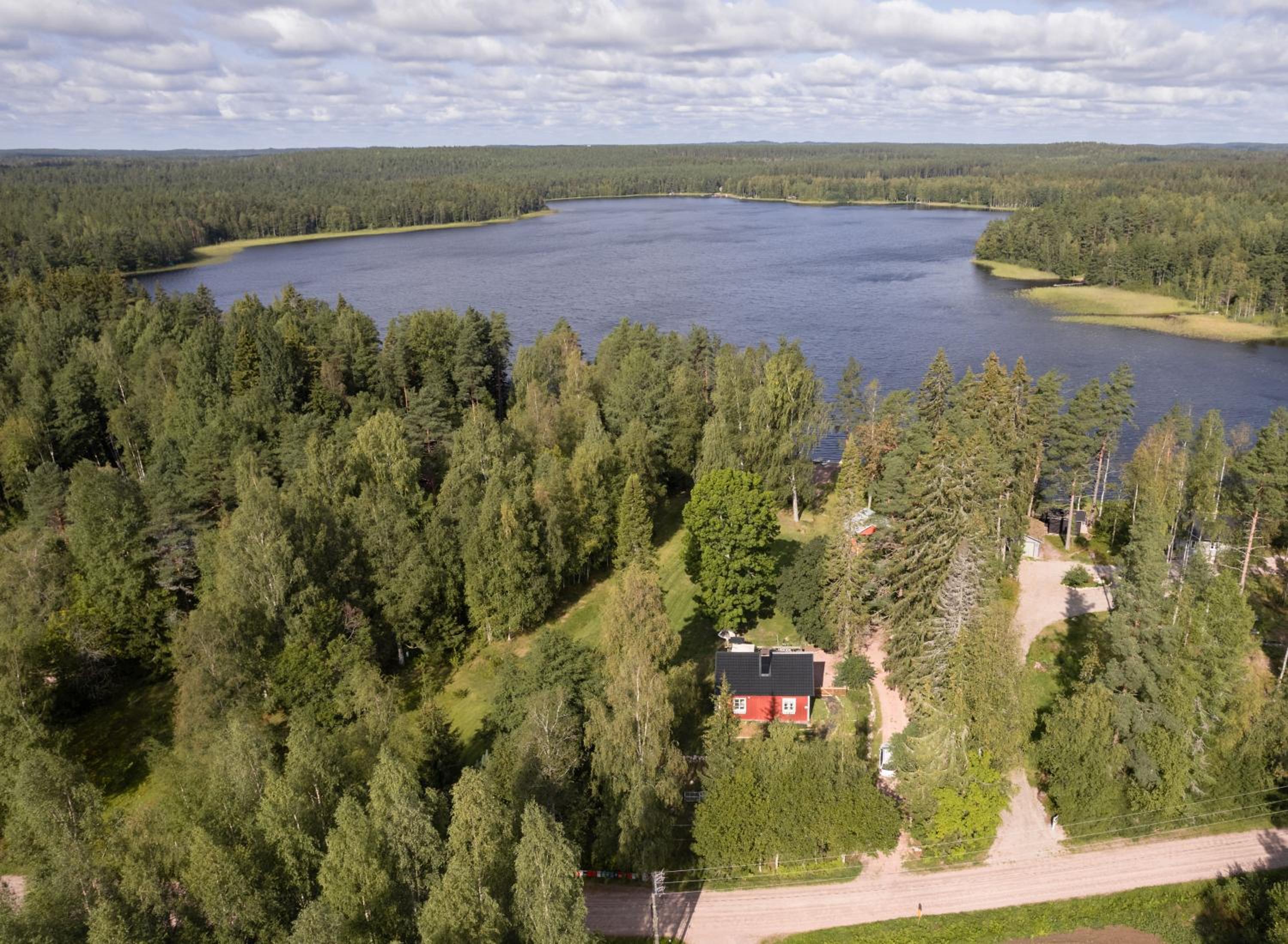 Beautifully renovated lakeside red cottage view 2