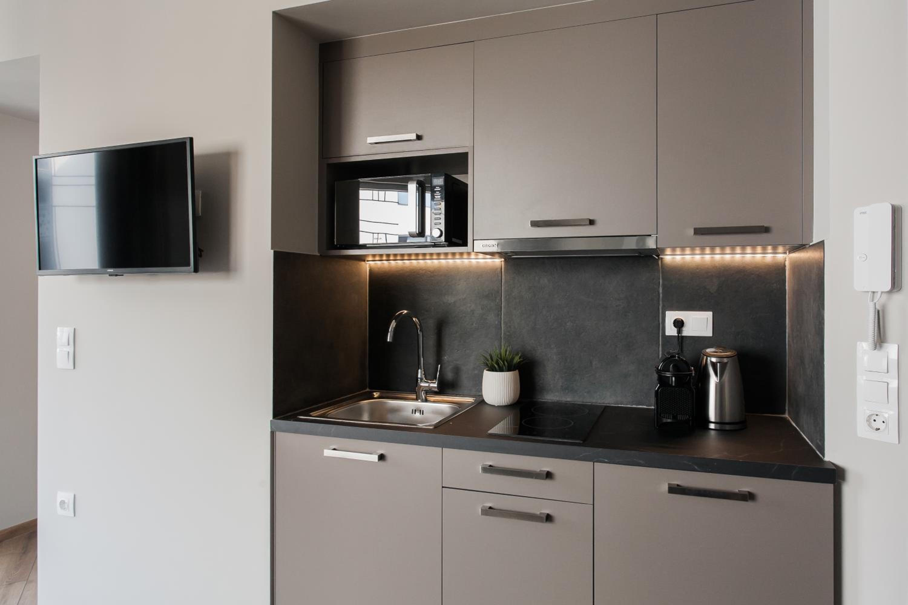 WYZ Athens Apartments by UPSTREET
