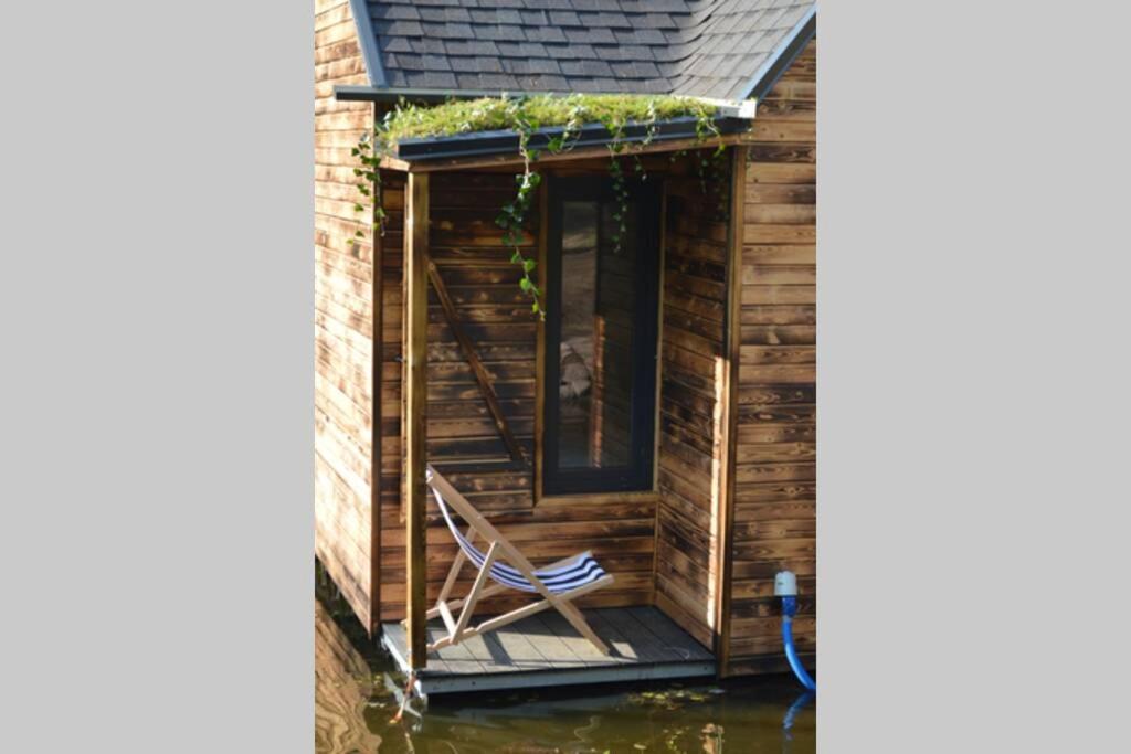 heather hut, off-grid cottage on a pond+2 ha view 5