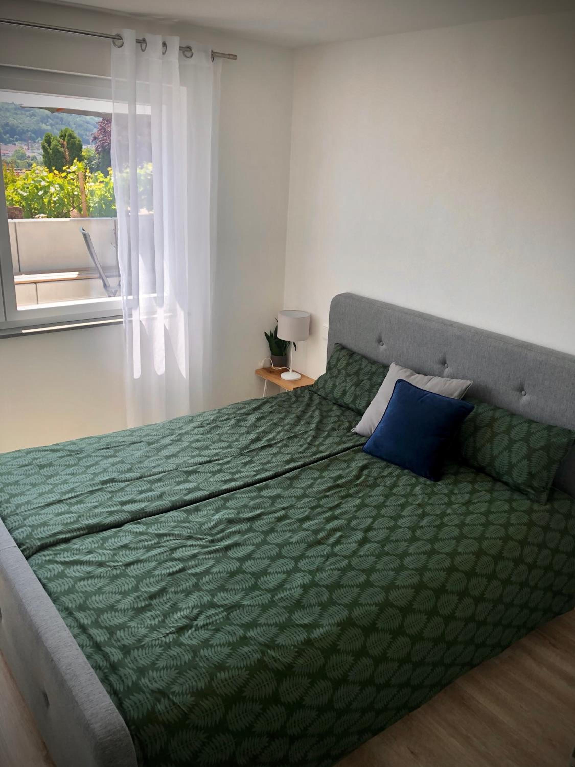 Ferienwohnung no.55 en Lörrach — bedroom