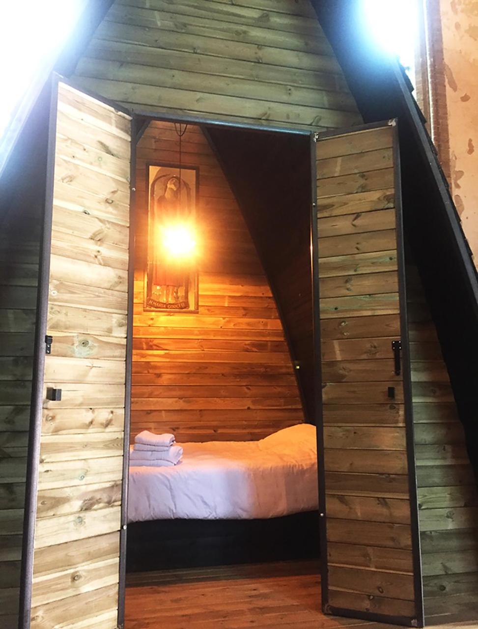 Sleeping in a Church - Bed & Bar Tolomeus