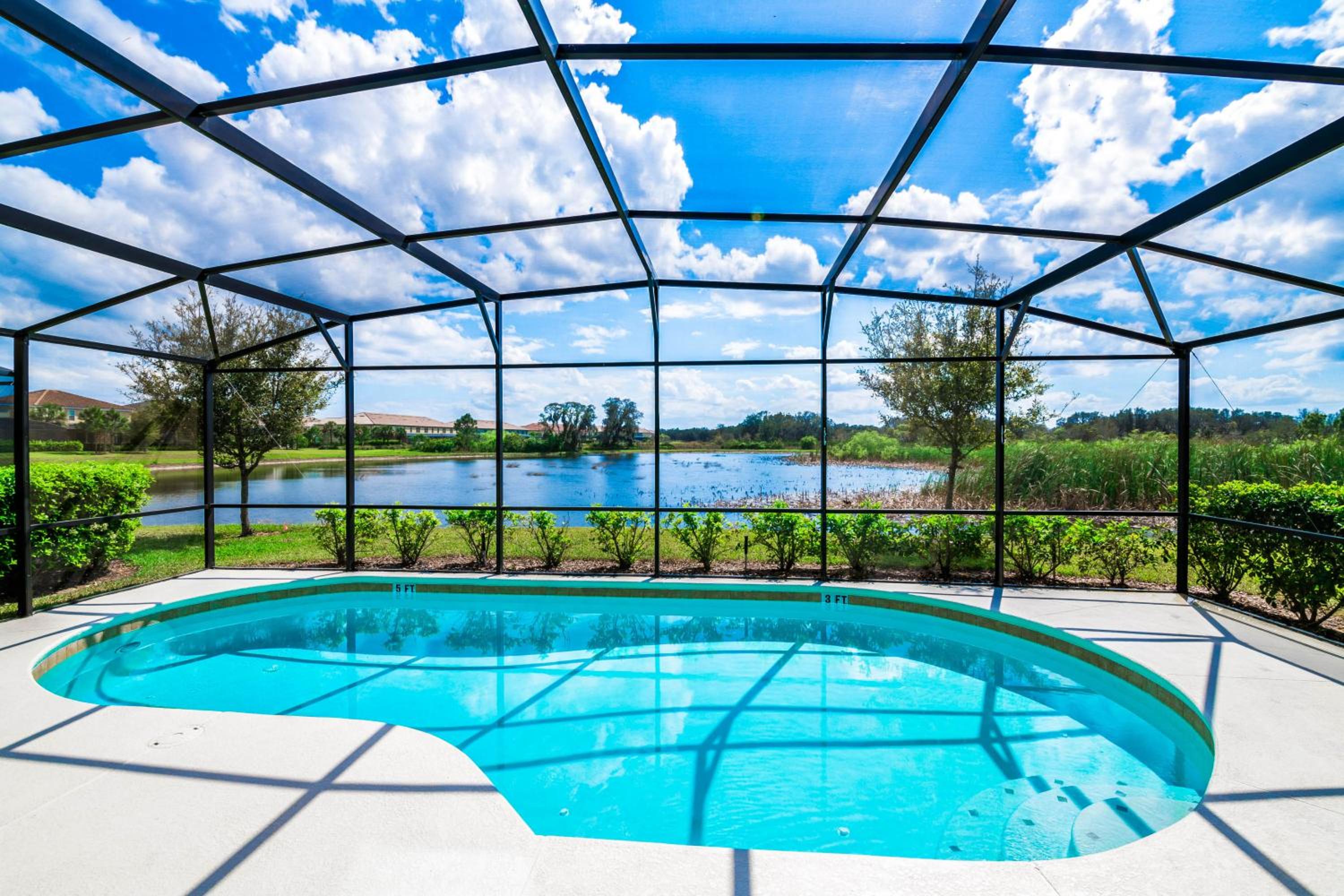 Stunning Lake View from South Facing Extended Pool Deck with Games Room on Gated Solterra Resort view 2