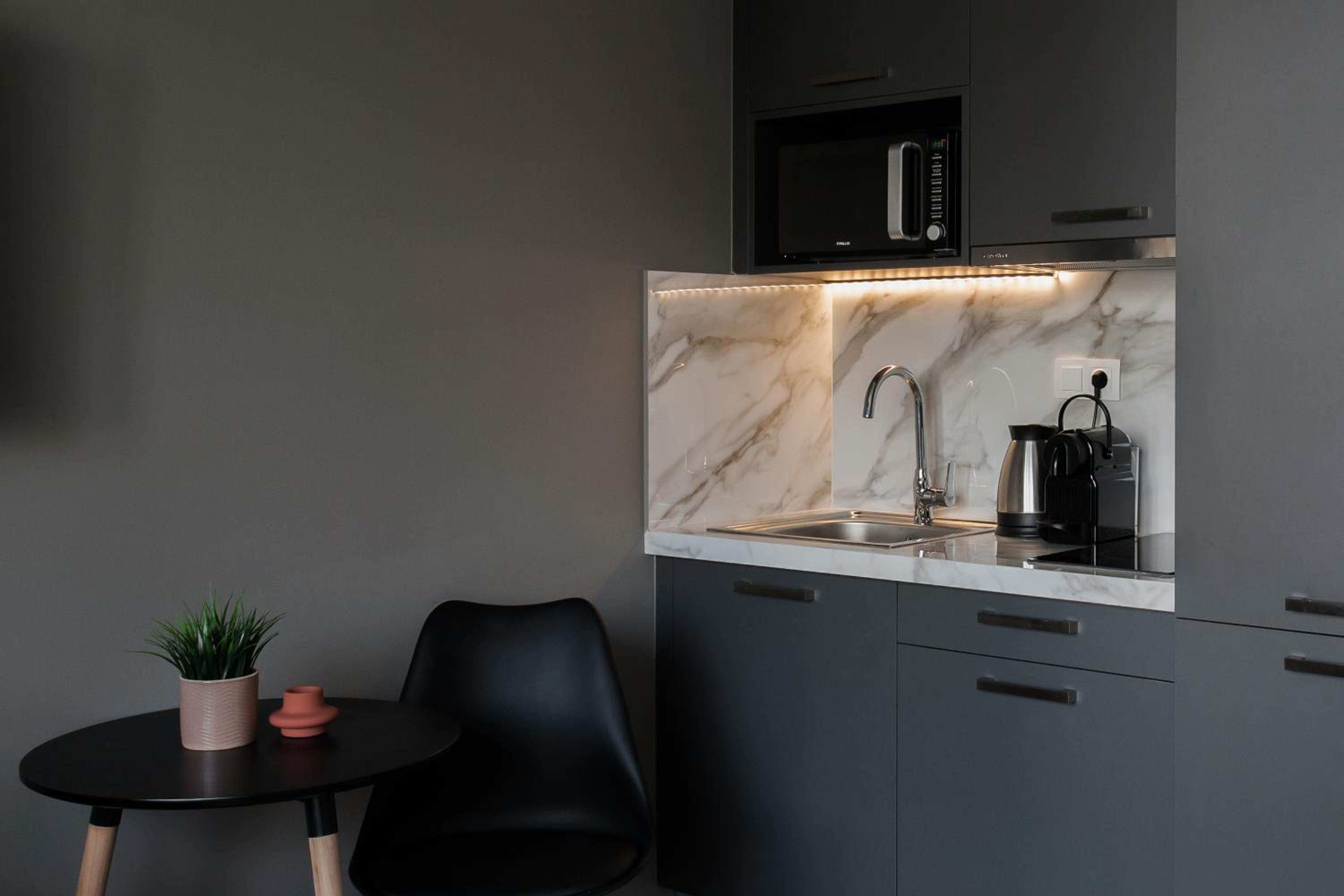 WYZ Athens Apartments by UPSTREET