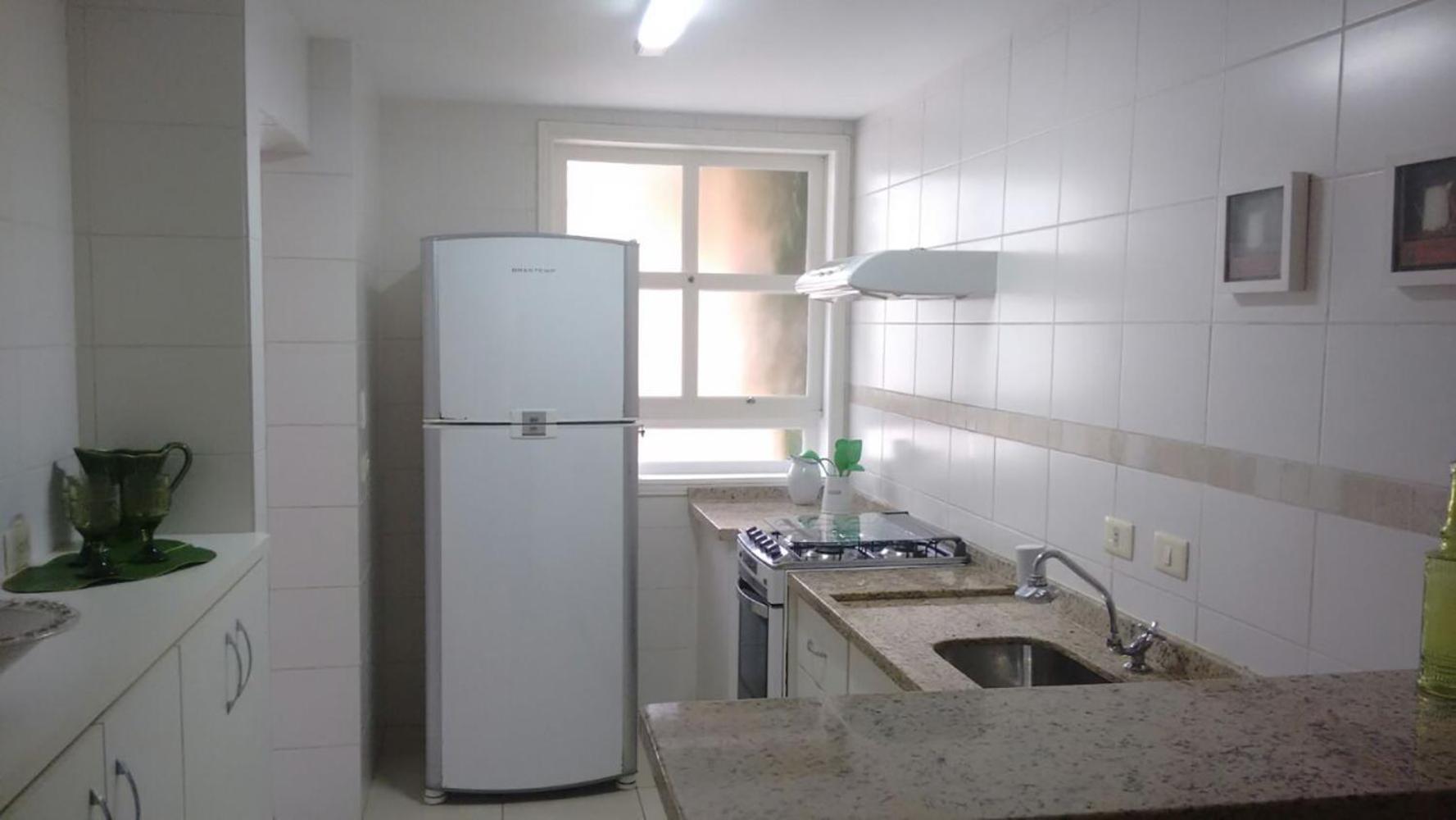 Casa com piscina e churrasq na Praia de Camburí