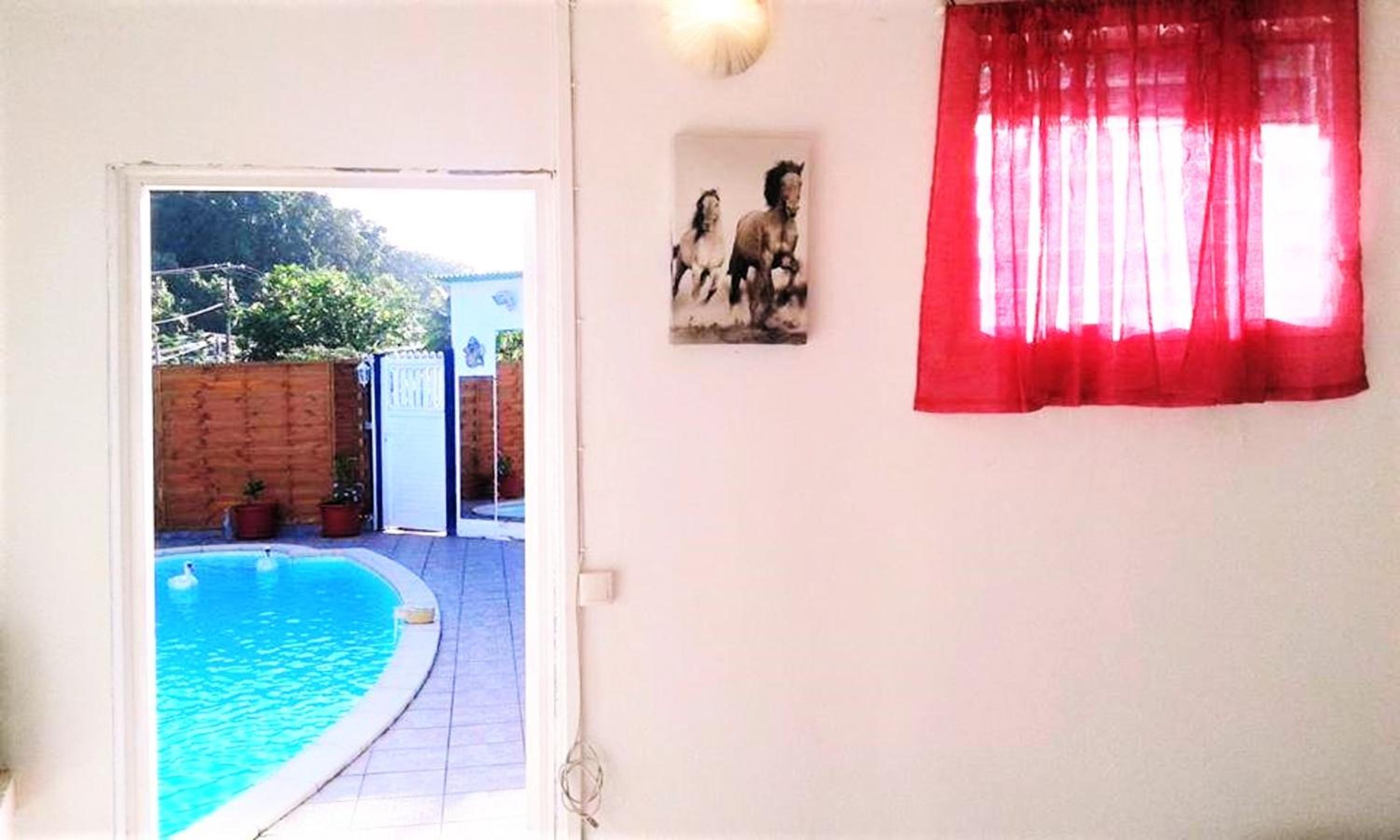 Maison cosy Les Abymes avec piscine view 4