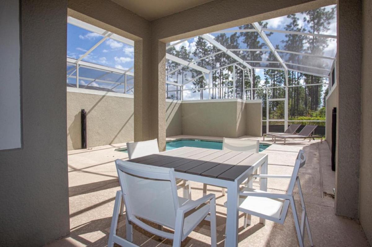 Awesome Four Bedrooms Townhouse with Pool at Champions Gate Resort 0432 view 3