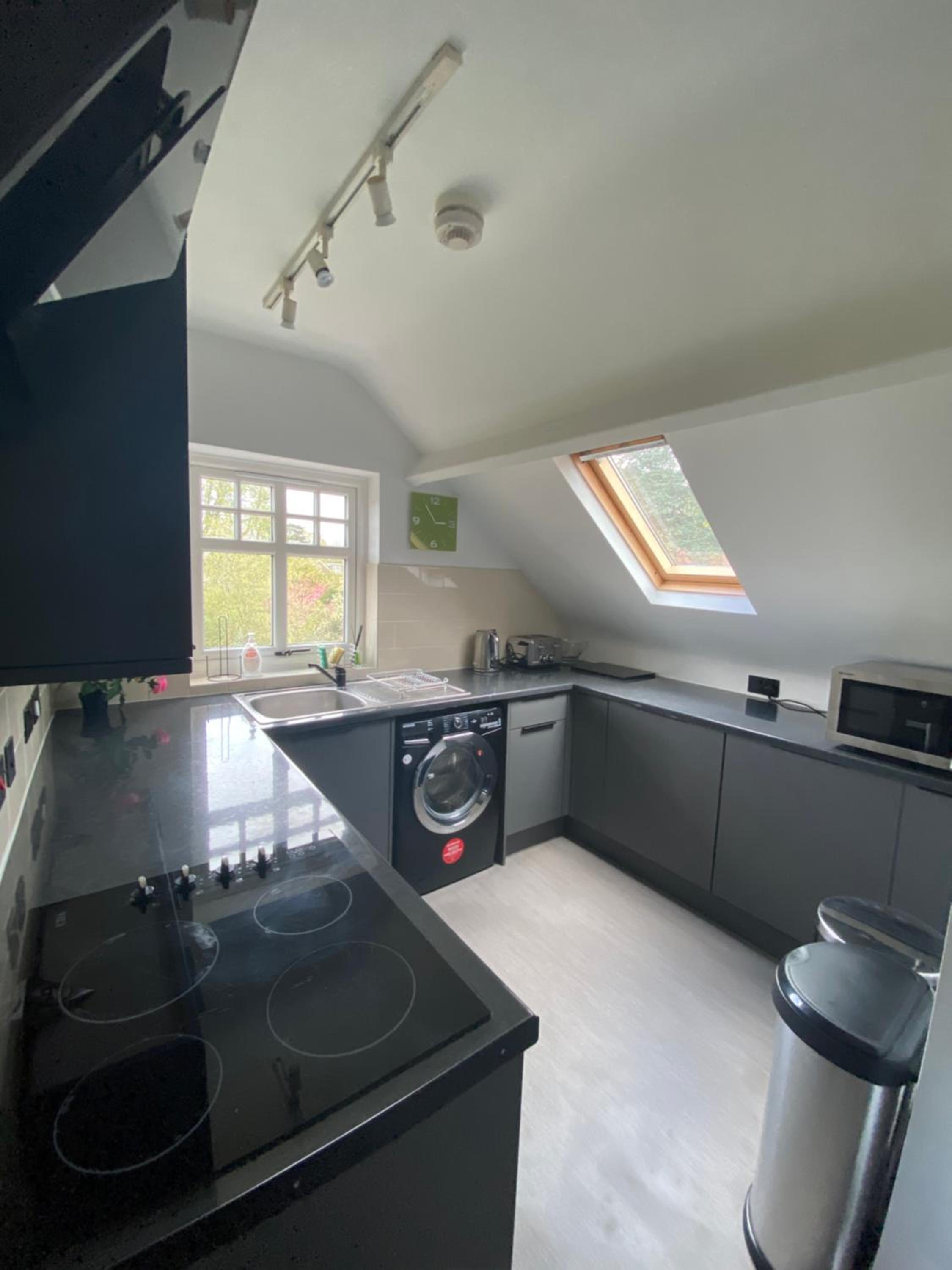 Pristine 2 bedroom apartment with off street parking view 2