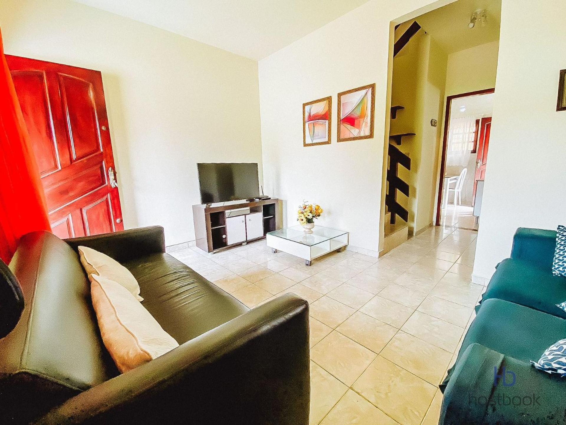 Large duplex with backyard 300m from downtown beach
