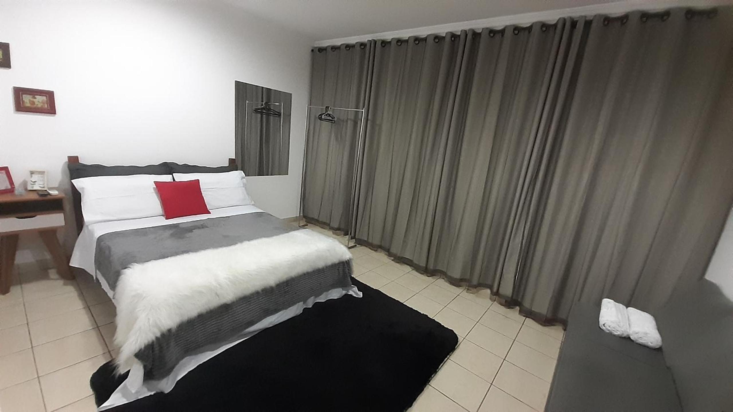 Suite climatizada, ao lado da praca principal