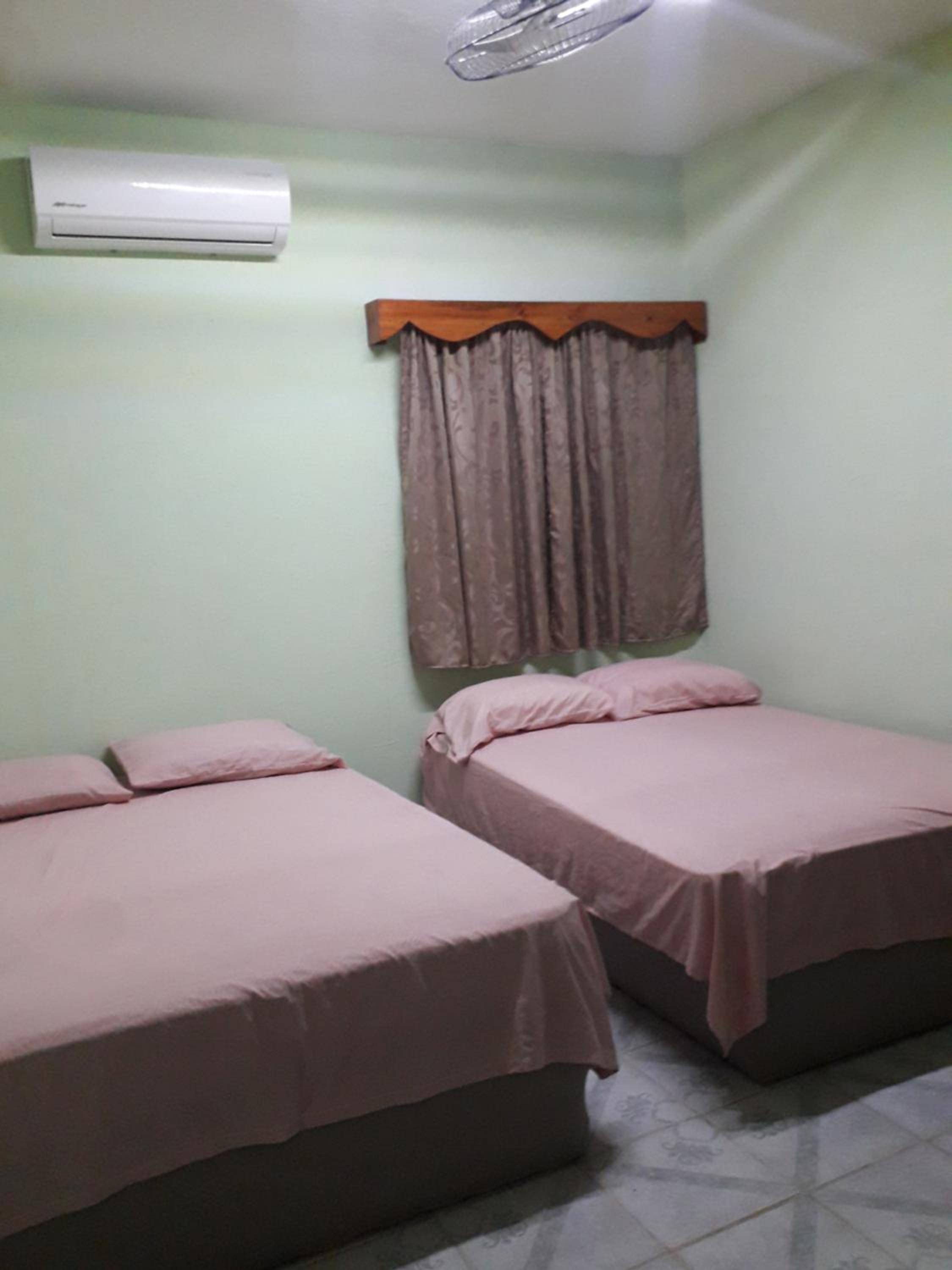 CASA CON TODO LOS SERVICIOS Y 2 RECAMARAS CLIMATIZADAS CON 2 CAMAS CADA UNO PARA 8 PERSONAs view 4