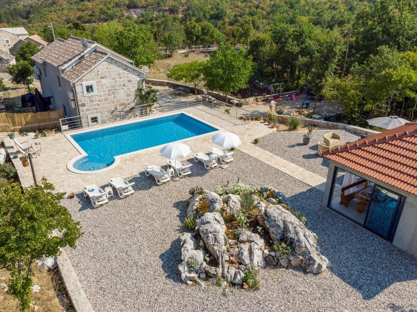 Villa Lugareva with 52 sqm private pool, 4 bedrooms, 4 bathrooms, summer kitchen, traditional environment, playground view 5