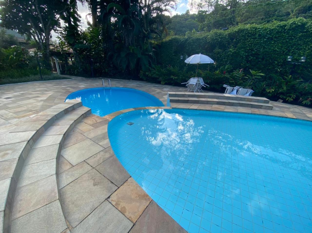 Hotel Apto. No terreo Enseada Ubatuba com piscina p/ 5 pessoas - Image 1