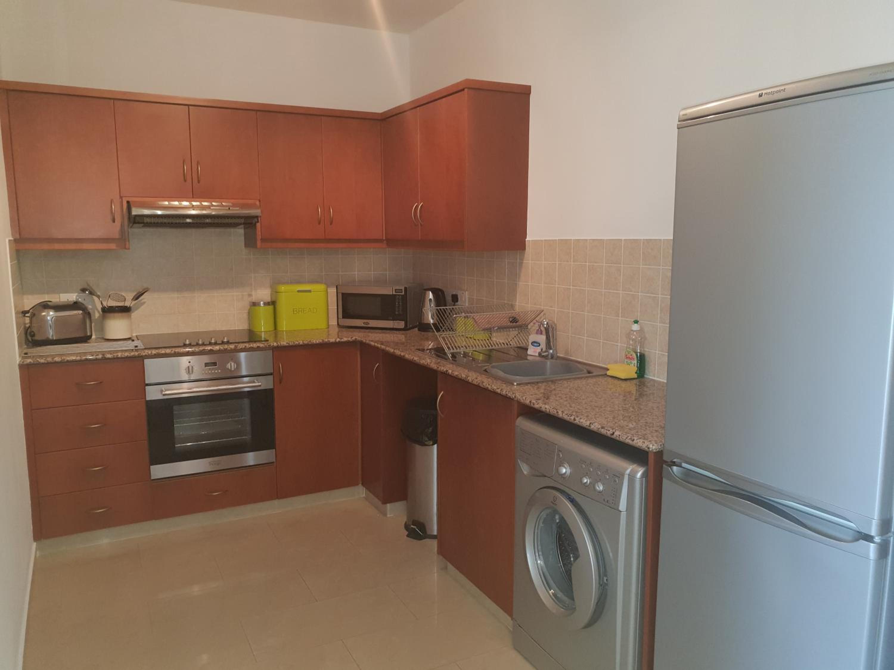 Stunning apartment C106 with balcony looking over pool view 5