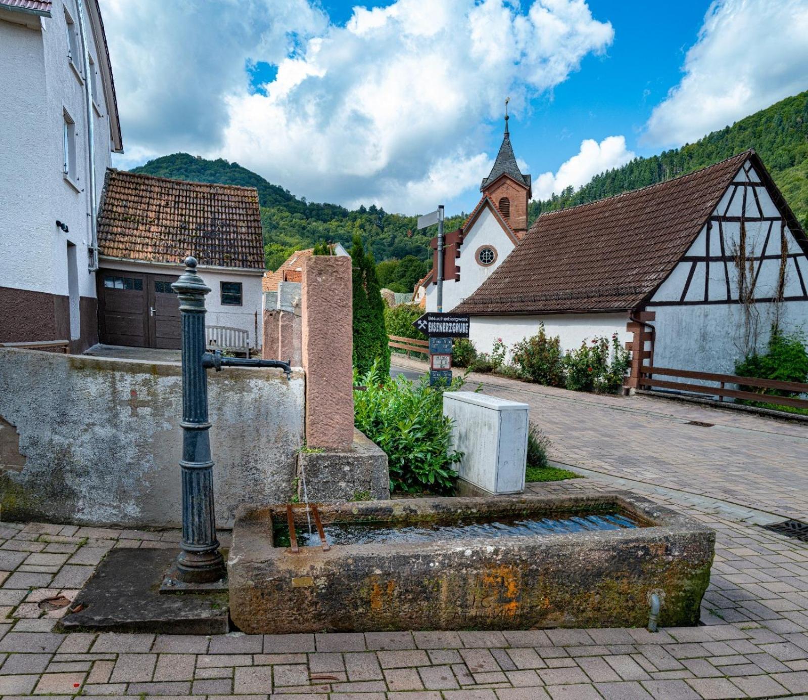 Haus-amBrunnen