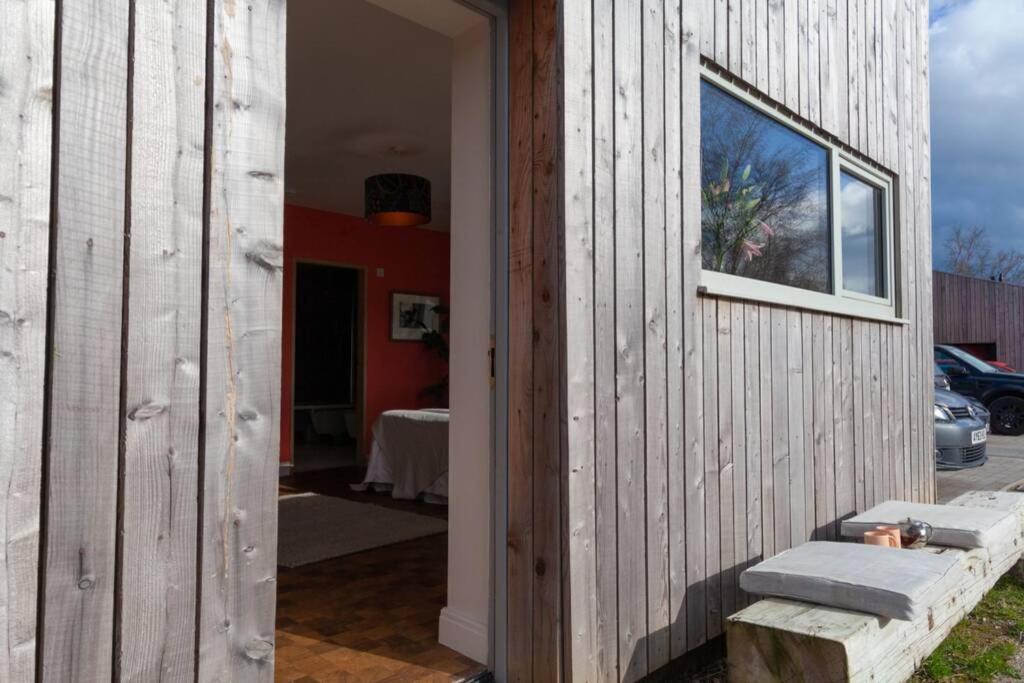 "The Studio" Contemporary studio with organic swimming pool view 4