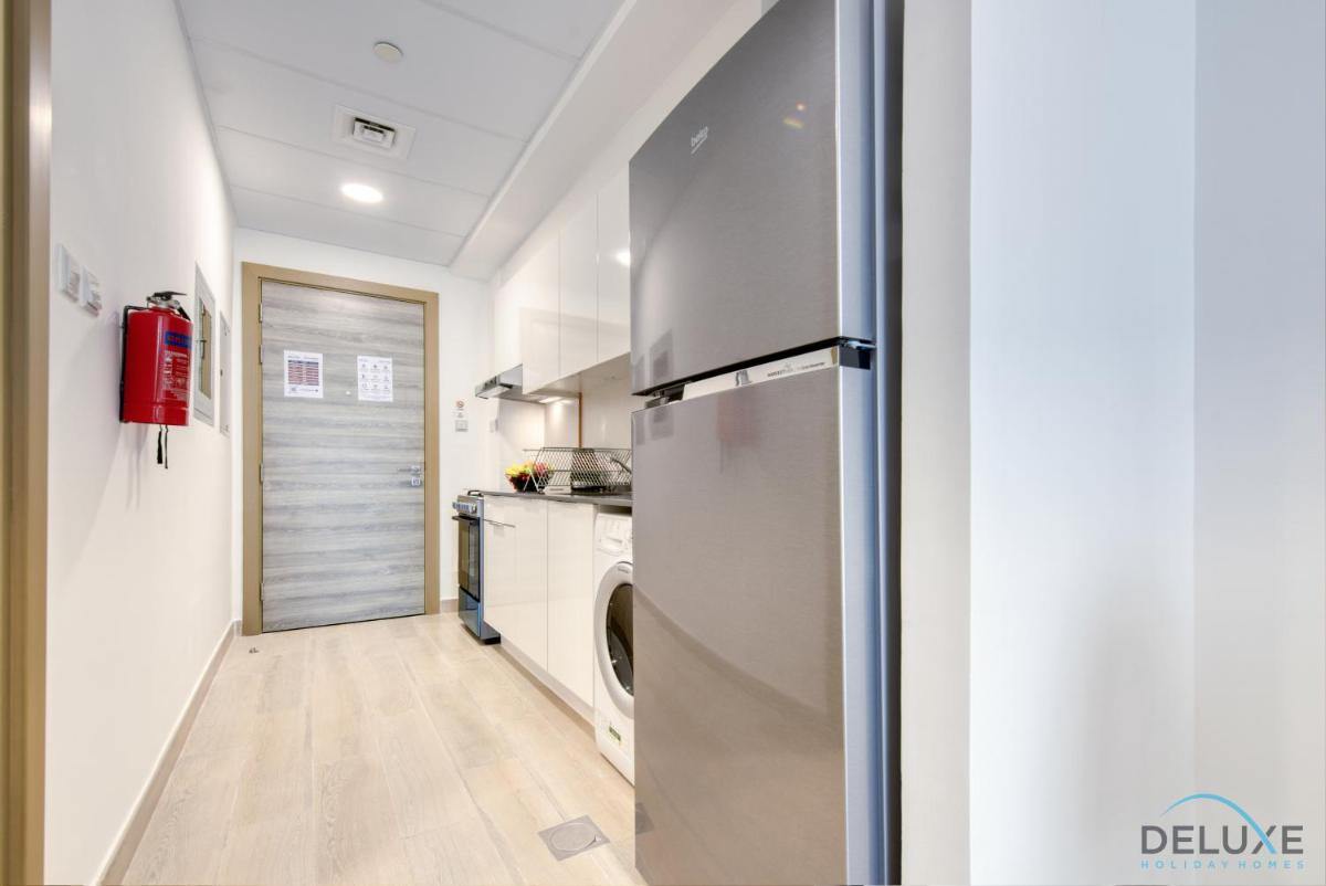 Snug Studio at Bloom Towers C JVC by Deluxe Holiday Homes