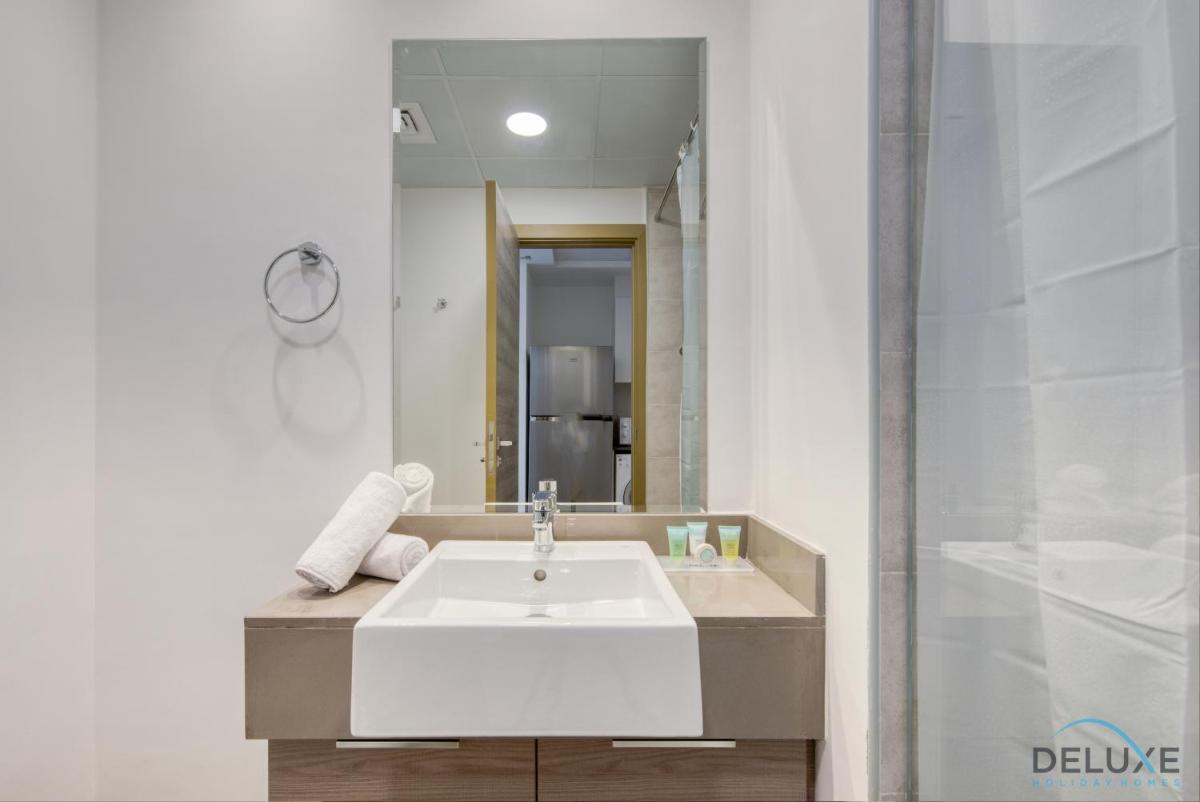 Snug Studio at Bloom Towers C JVC by Deluxe Holiday Homes