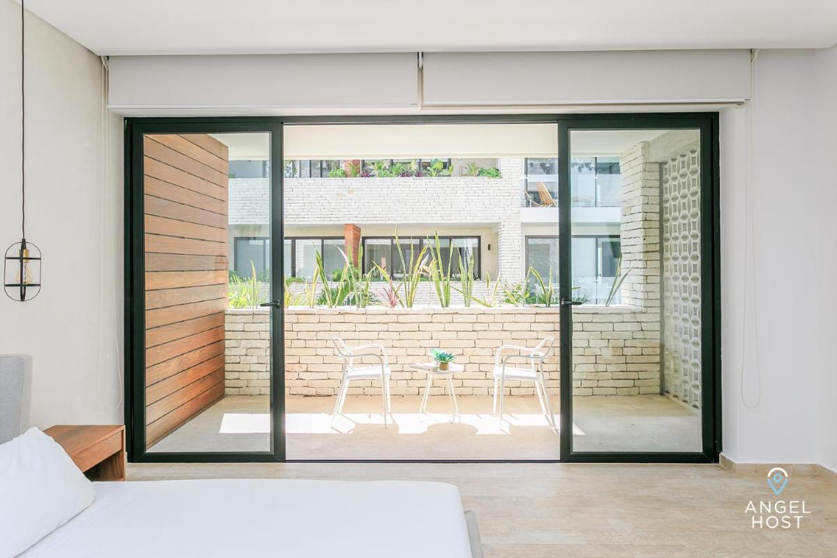 Beautifully Minimalistic Studio Wrapped in Nature by Stella Rentals - Property Image 36