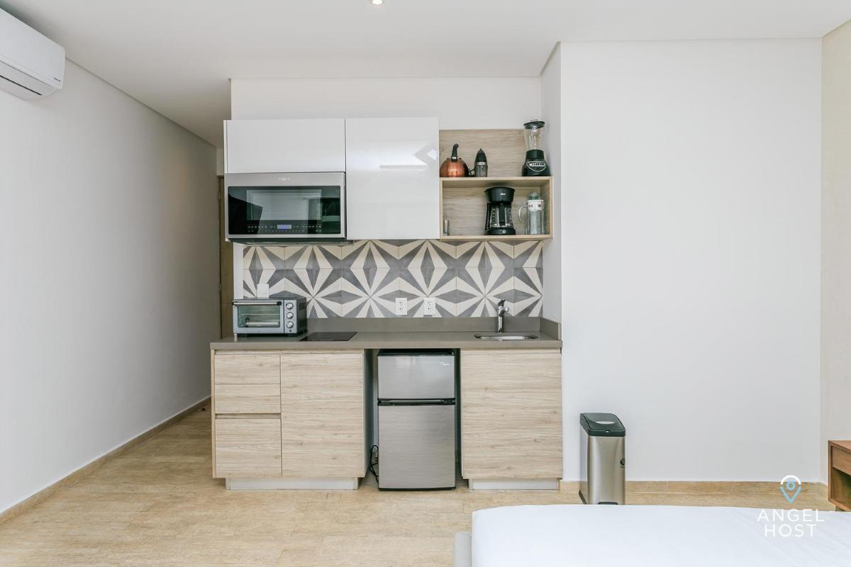 Beautifully Minimalistic Studio Wrapped in Nature by Stella Rentals - Property Image 32