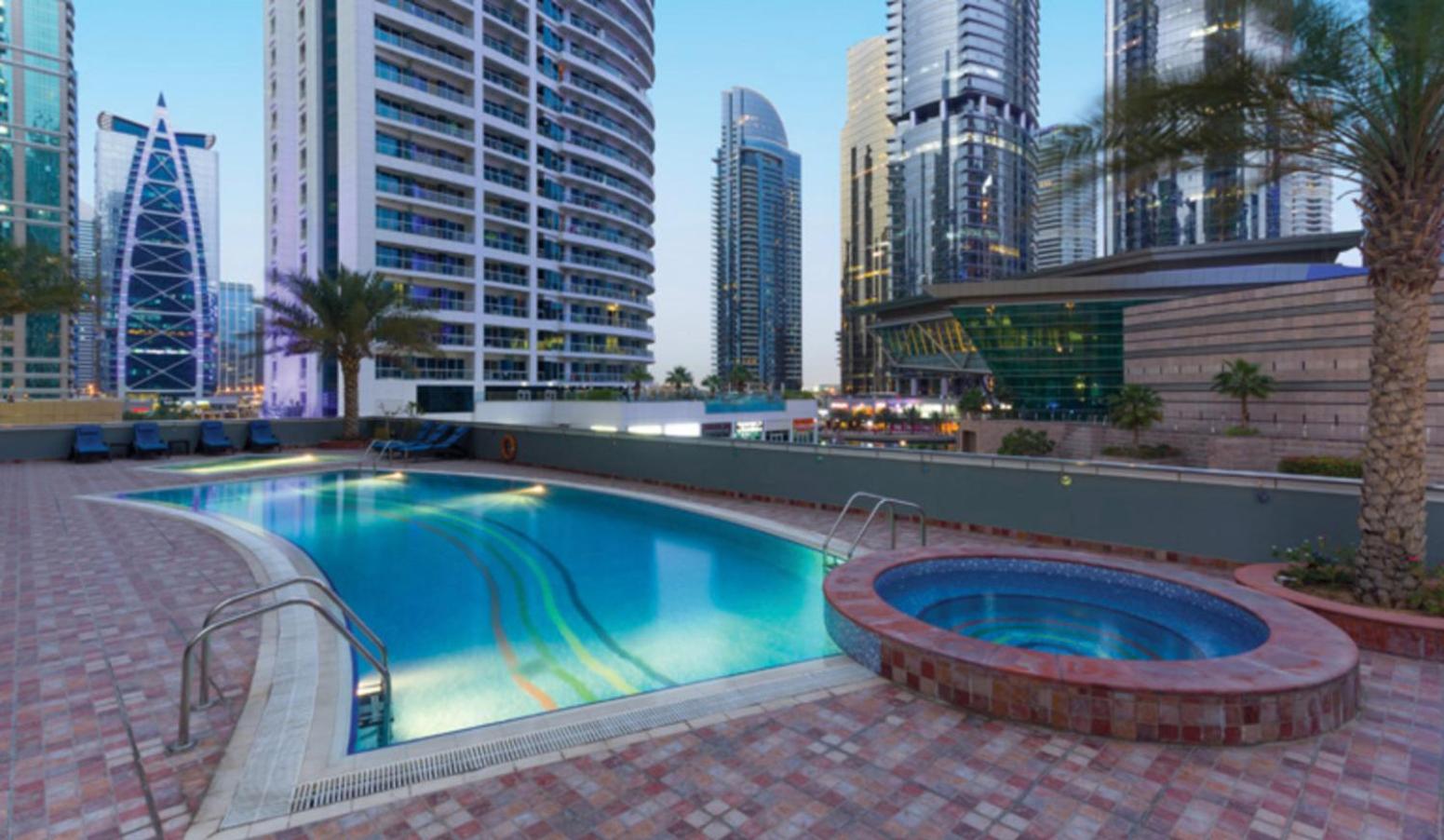 Luxury new apartment on the metro, facing Dubai marina.