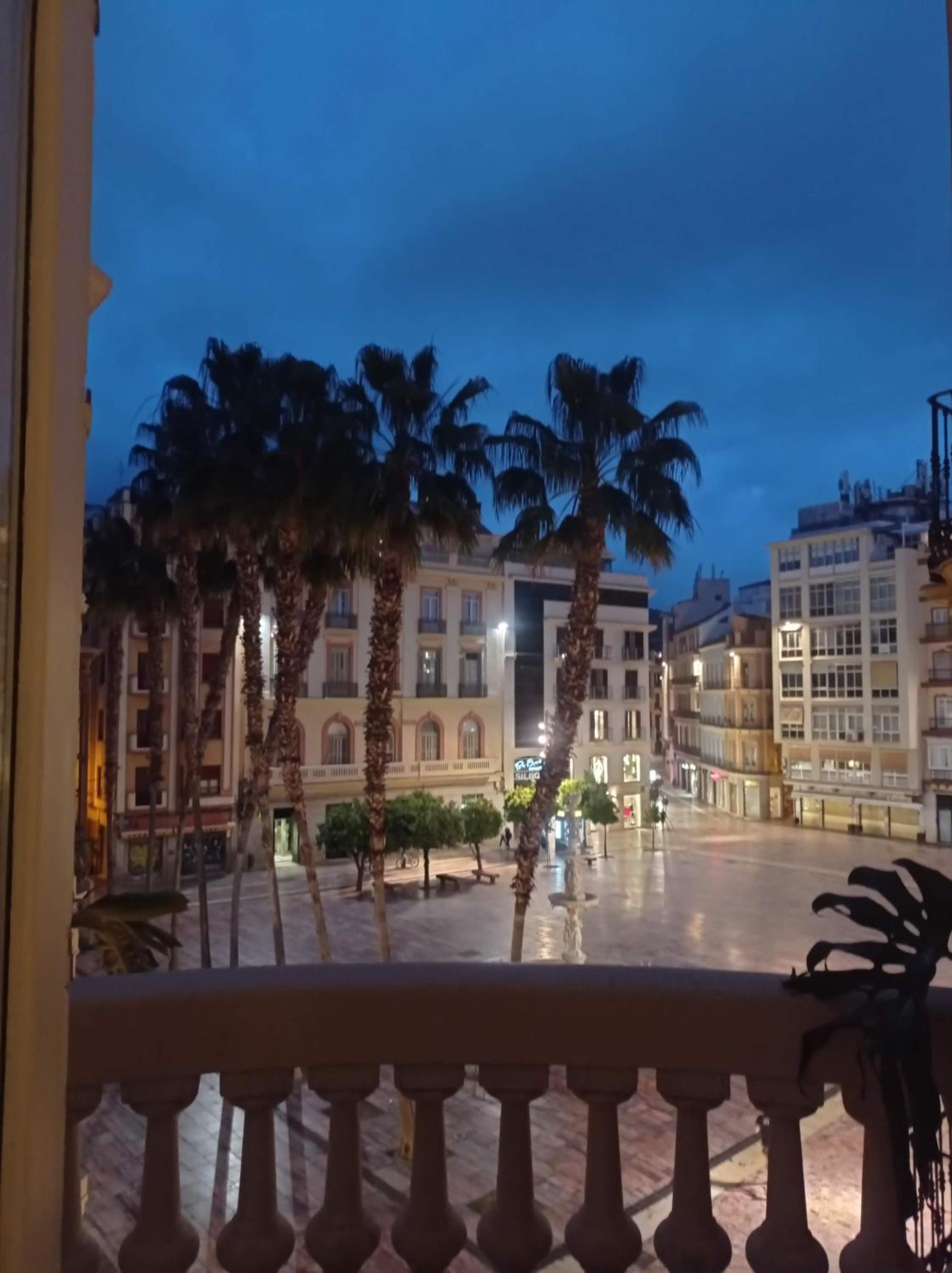 Historic 19th-Century Apartment with Balcony Overlooking Plaza