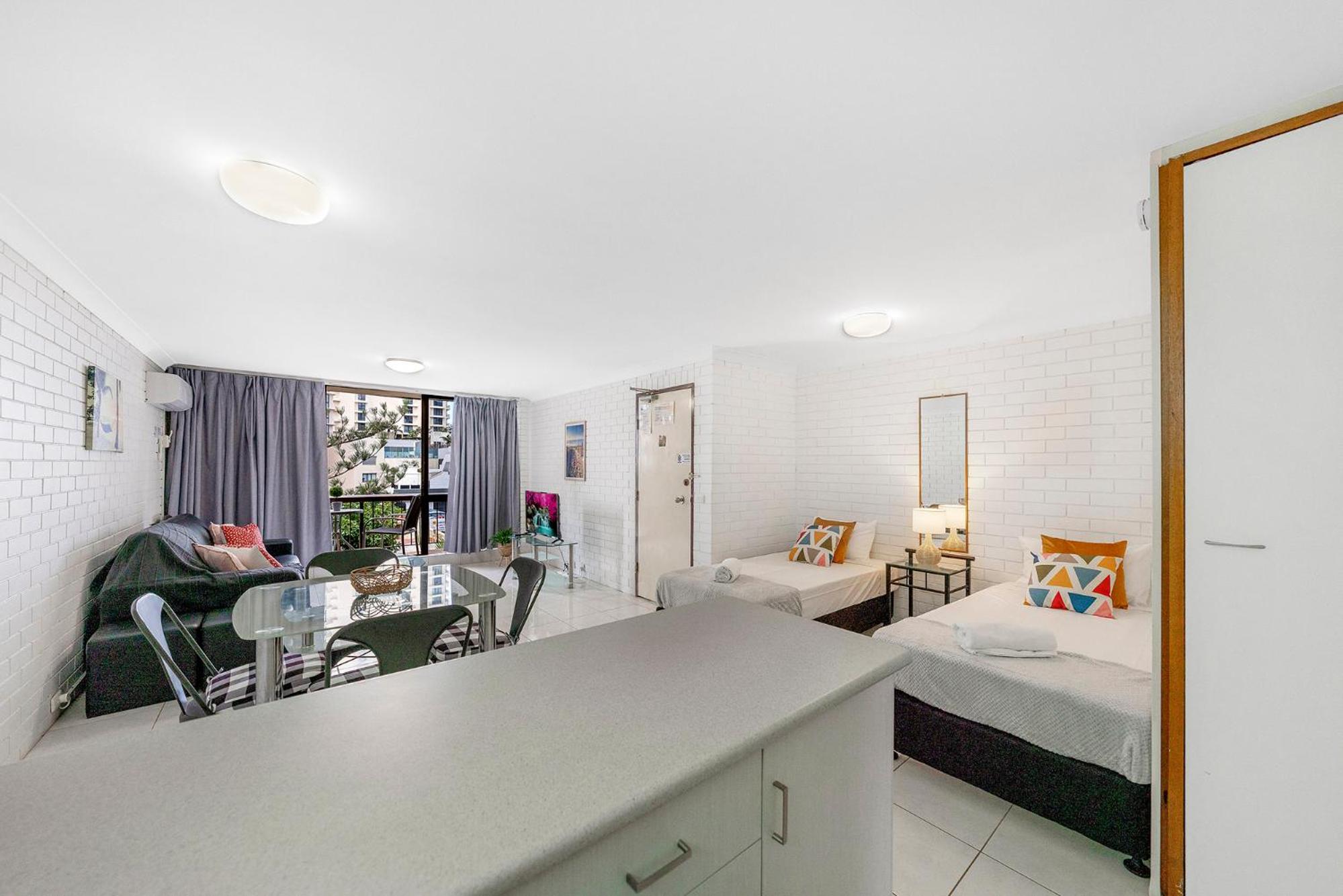 Surfers Paradise- meters from the beach!
