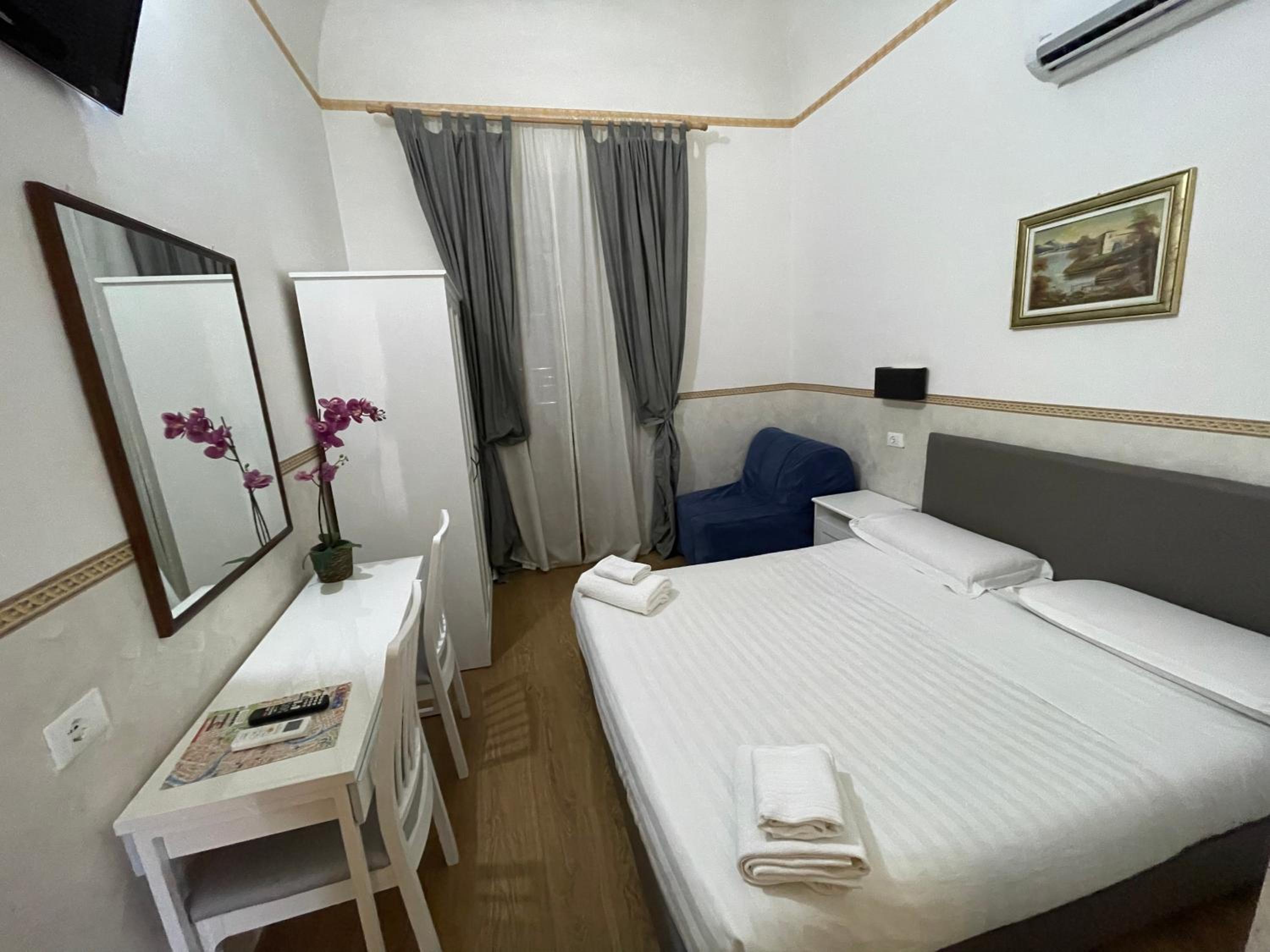 Conte GuestHouse en Rome — hotel room