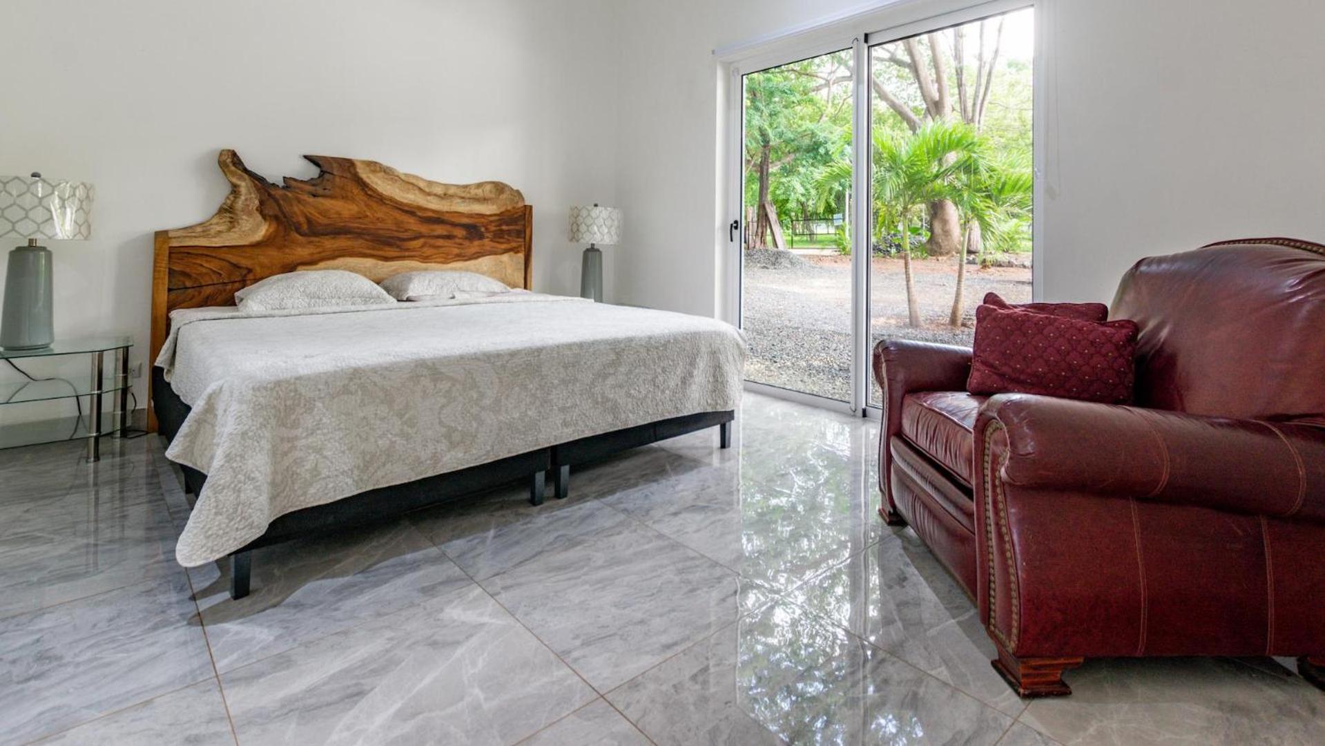 Modern Home and Guesthouse in a Peaceful Gated Community with a Private Swimming Pool