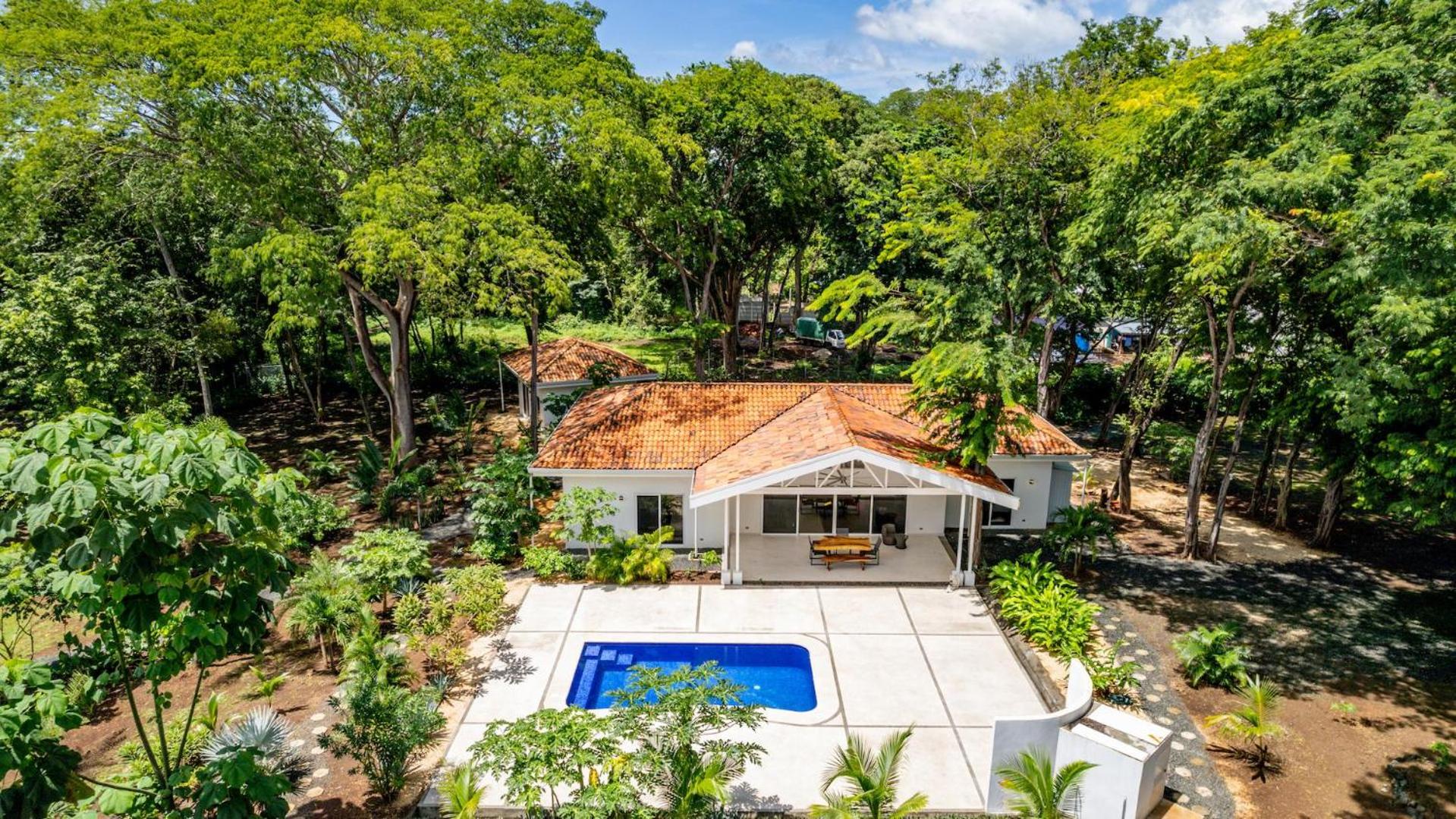 Modern Home and Guesthouse in a Peaceful Gated Community with a Private Swimming Pool