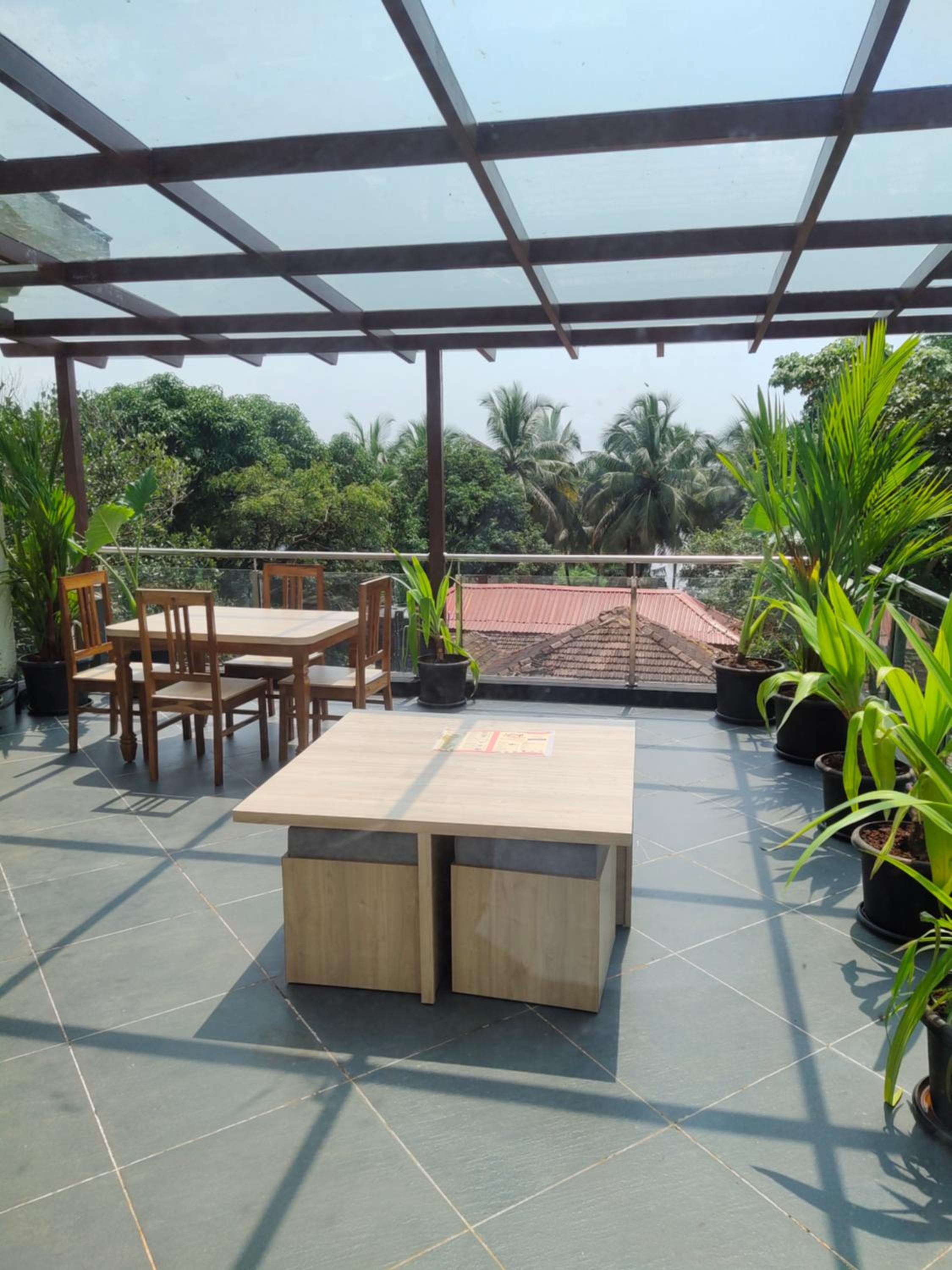 Woodside Retreat Serviced Apartments, 100 meters from baga river view 5