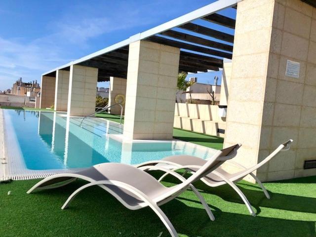 GATU PREMIUM Ático Parra, parking, piscina común, terraza, wifi , " Preferente mayores de 25 años y familias " photo 2