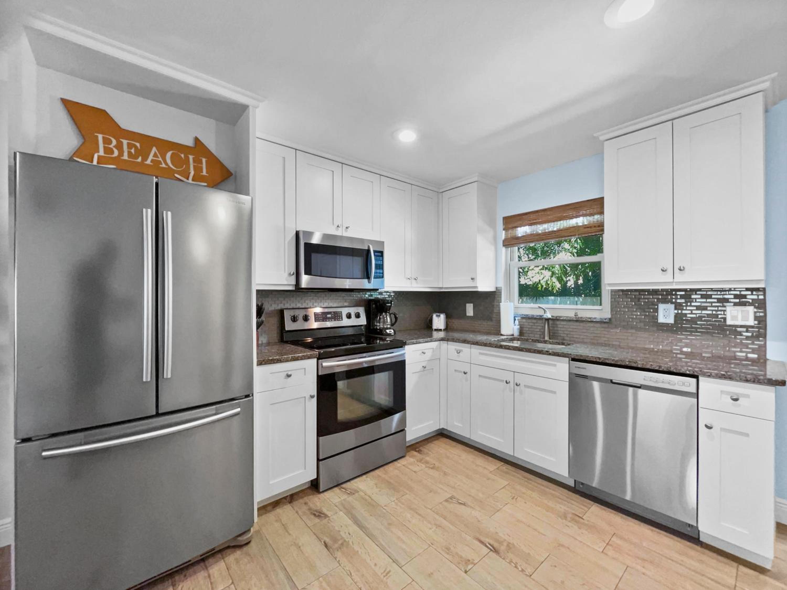 Walk to Beach, Updated Condo, Private Patio and Grill view 4