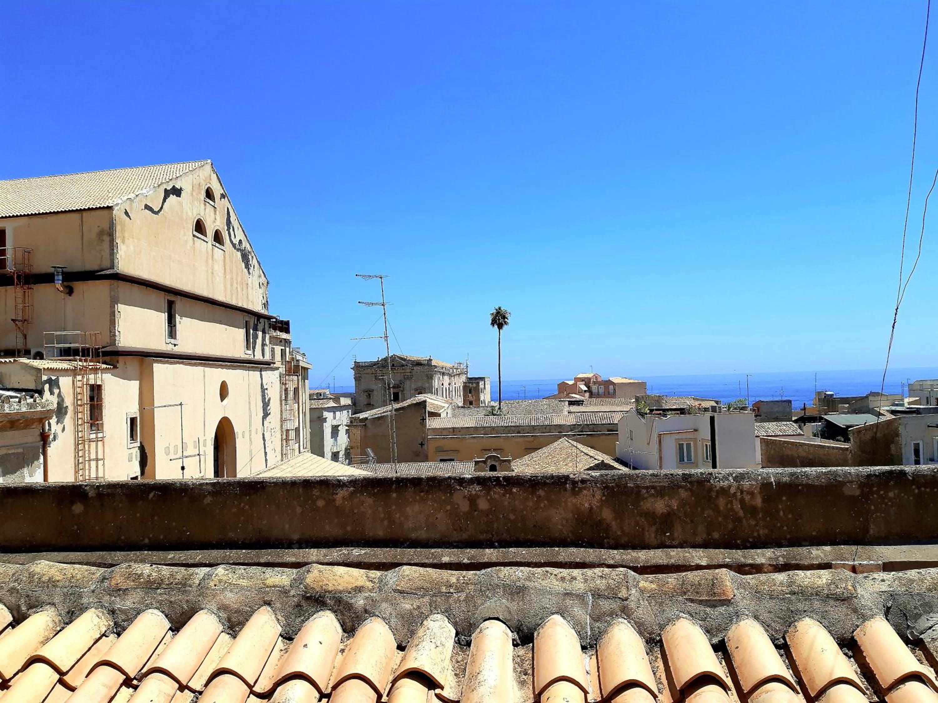 Incantevole appartamento in palazzo storico Ortigia