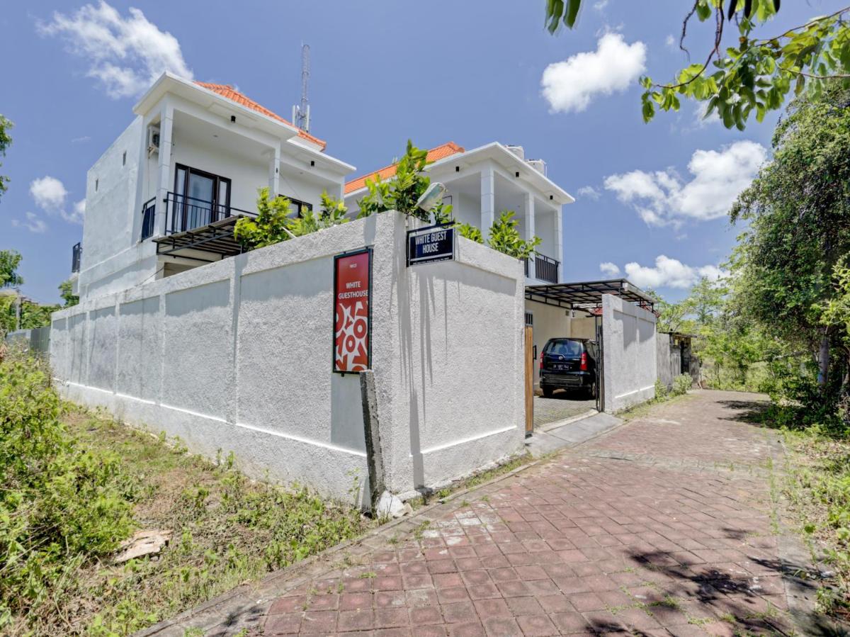 Hotel OYO 90525 White Guesthouse - Image 1