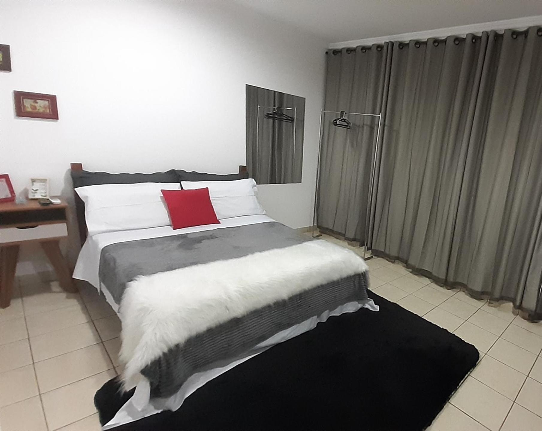 Suite climatizada, ao lado da praca principal