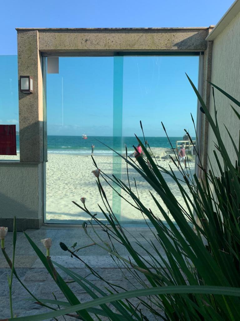 Triplex pé na areia