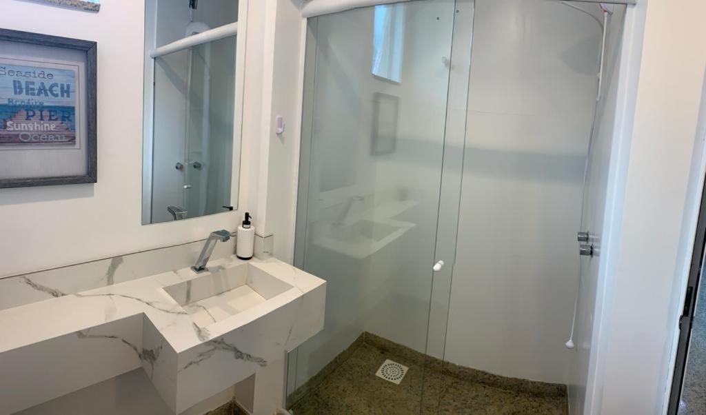 Triplex pé na areia