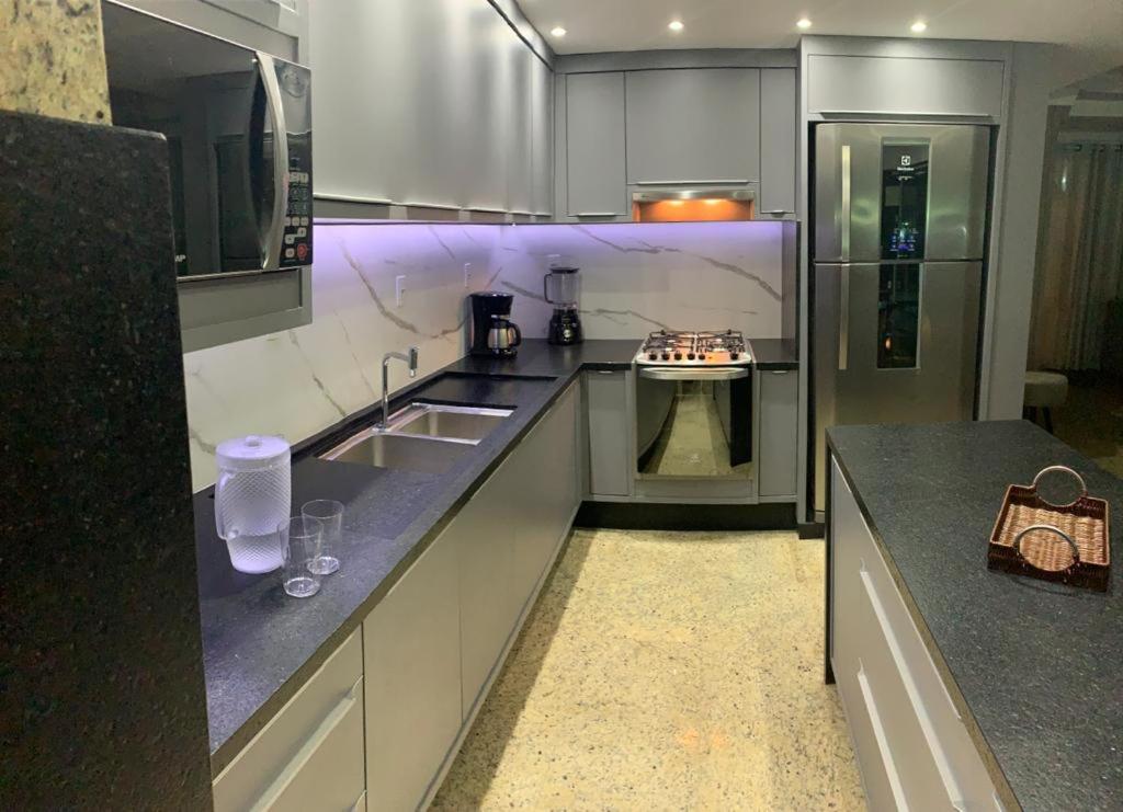 Triplex pé na areia