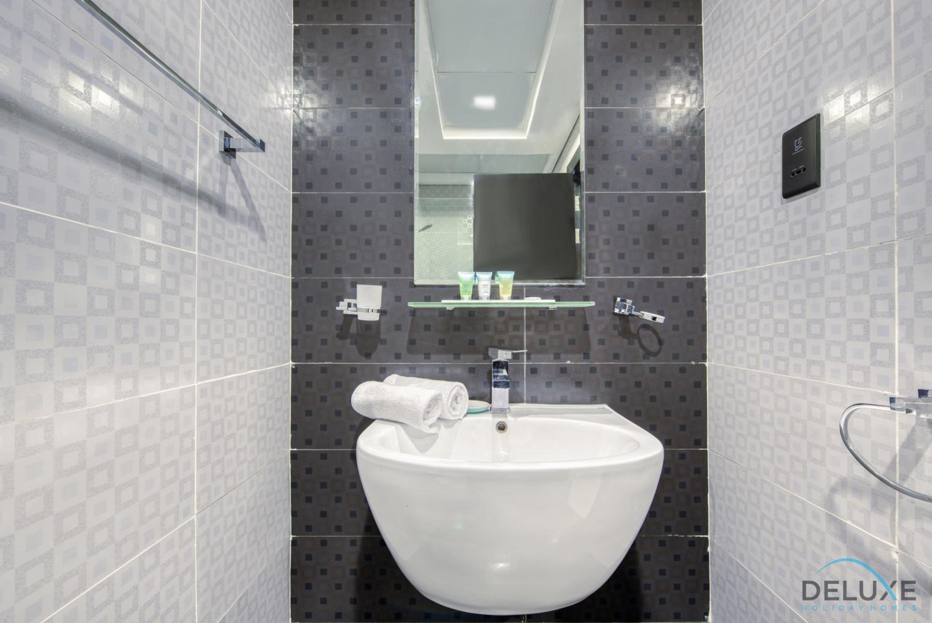 Captivating Studio at Giovanni Boutique Suites DSC by Deluxe Holiday Homes