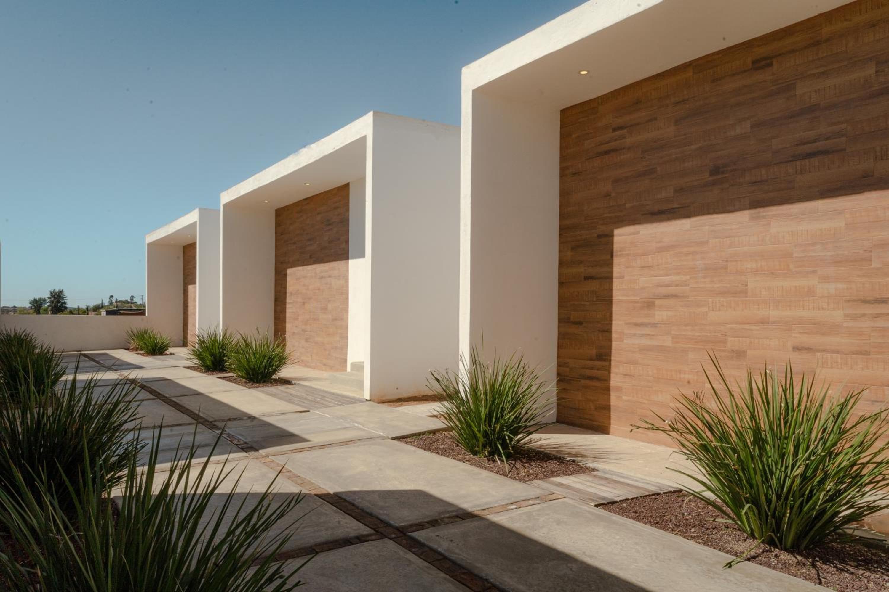 Hotel Collins Village Hotel Boutique - Image 1