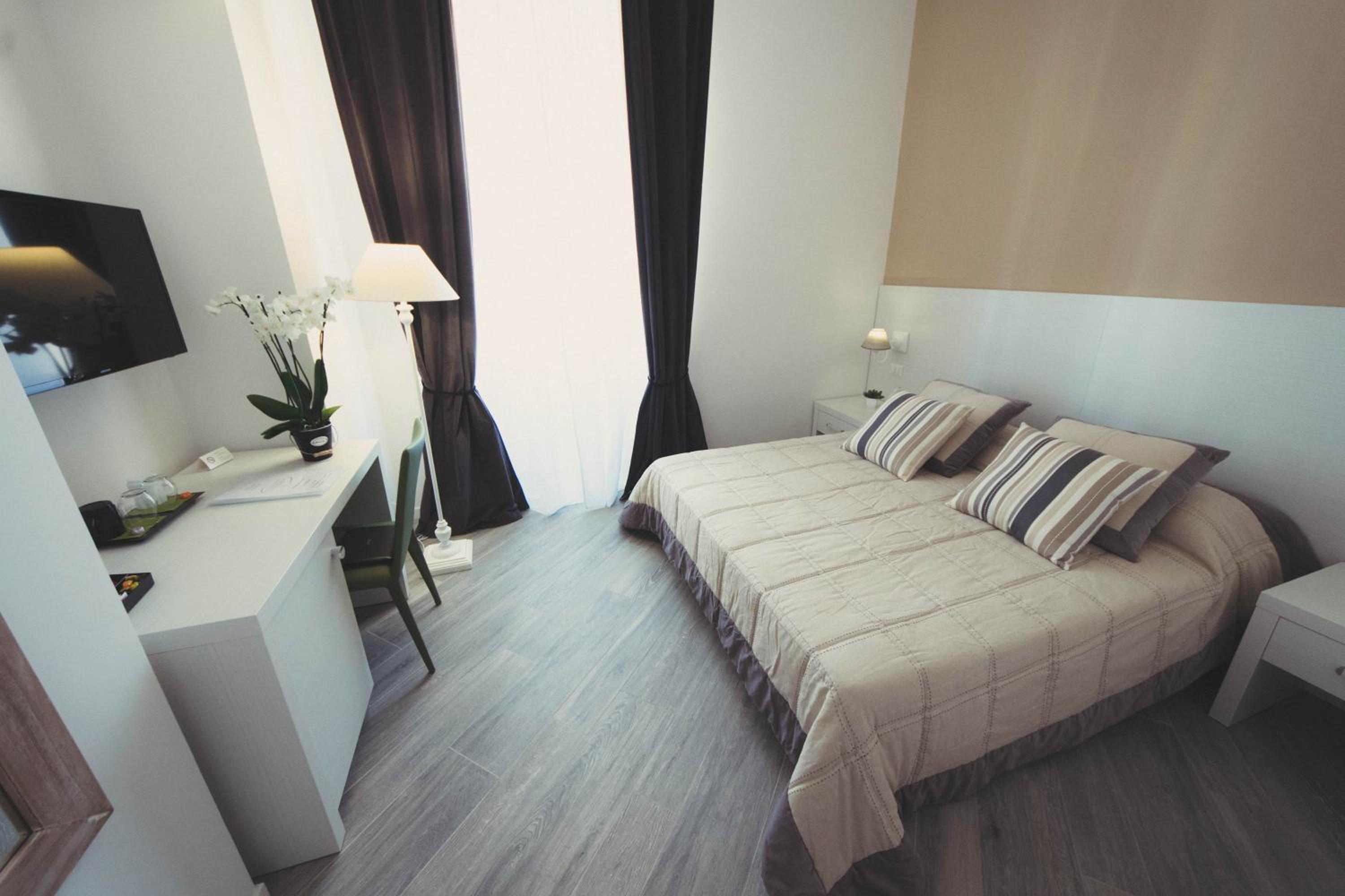 Vantaggio Suites en Rome — hotel room