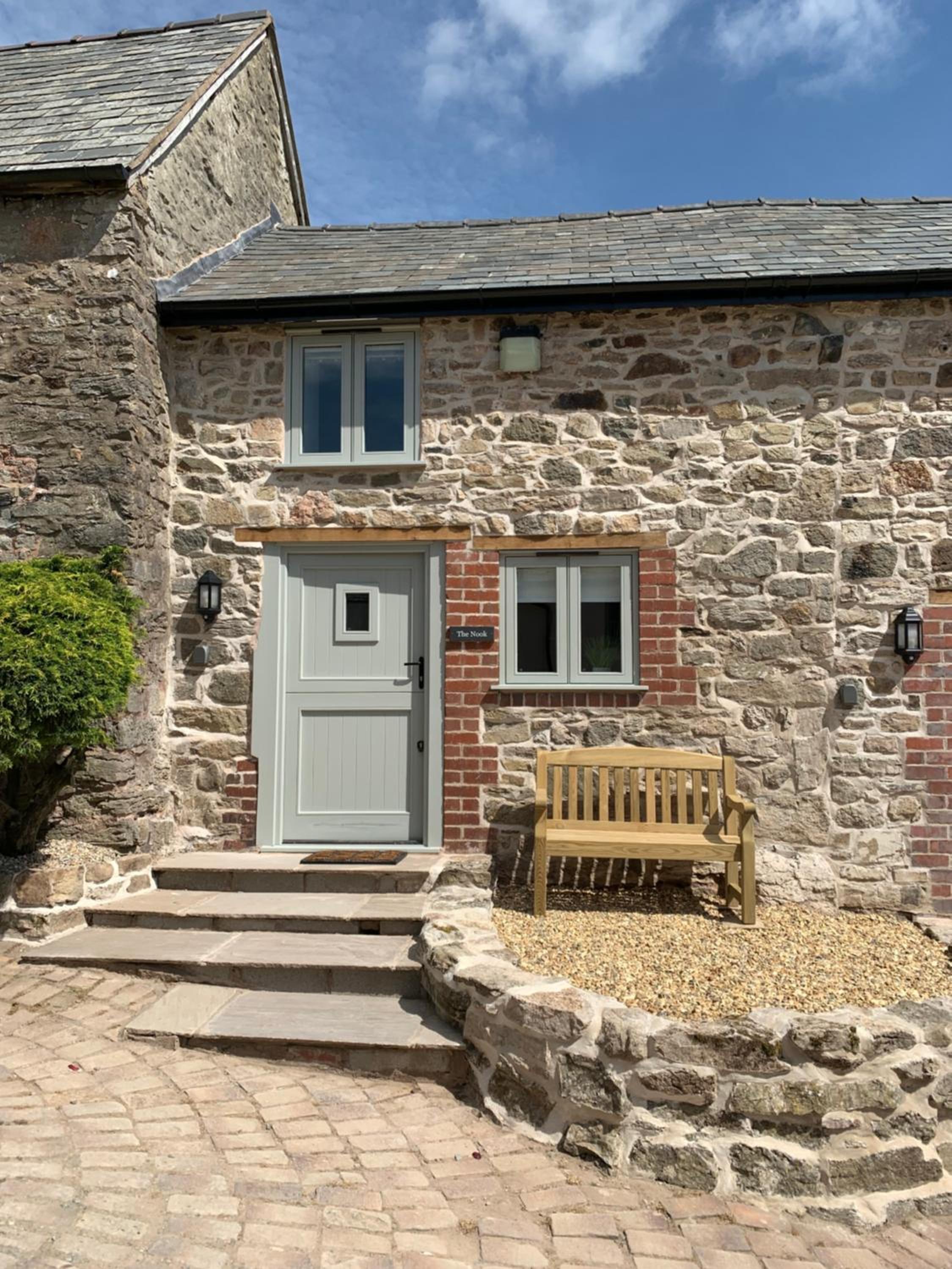 The Nook at Pentregaer Ucha, with tennis court & lake. view 5