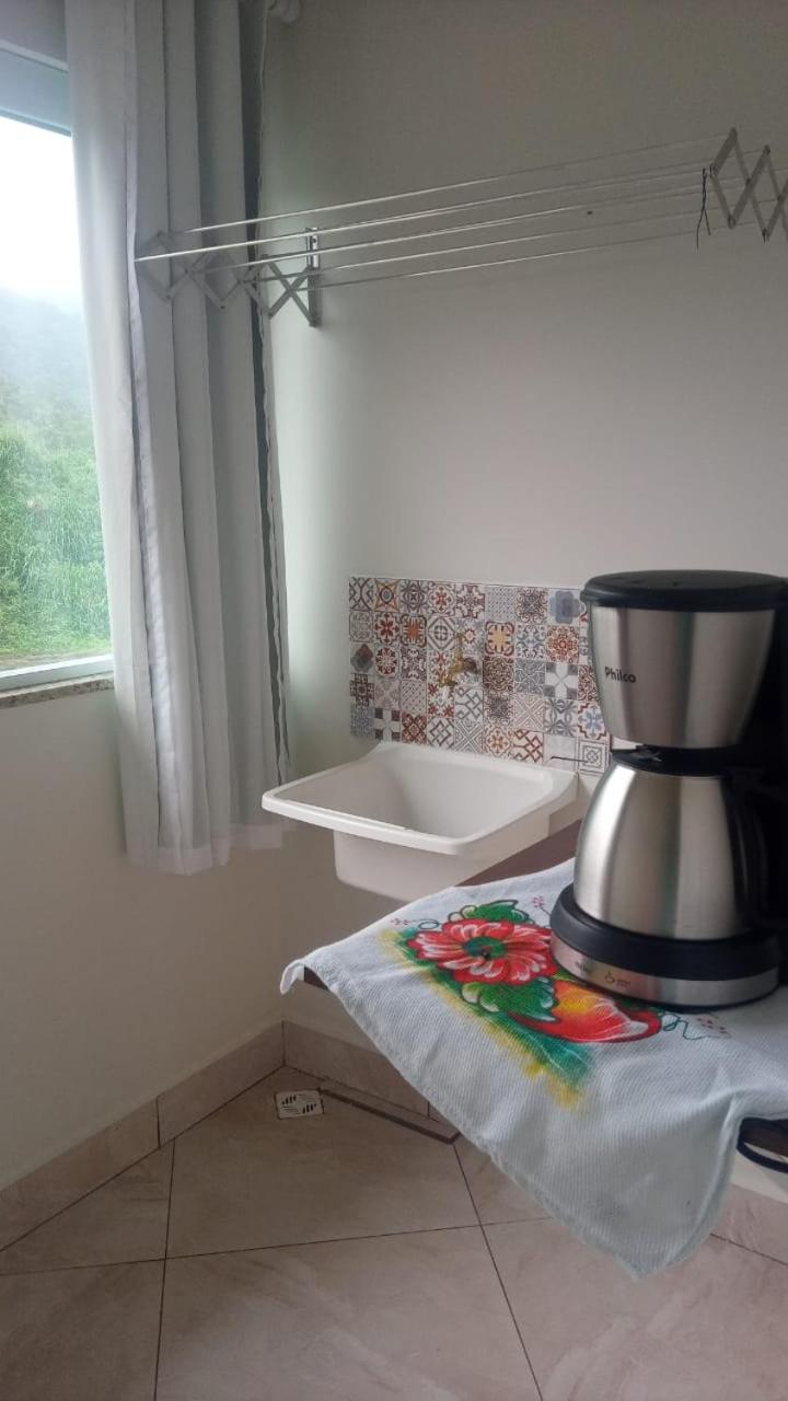 Casa de 4 suites com piscina, próxima a praias e do centro de Ubatuba
