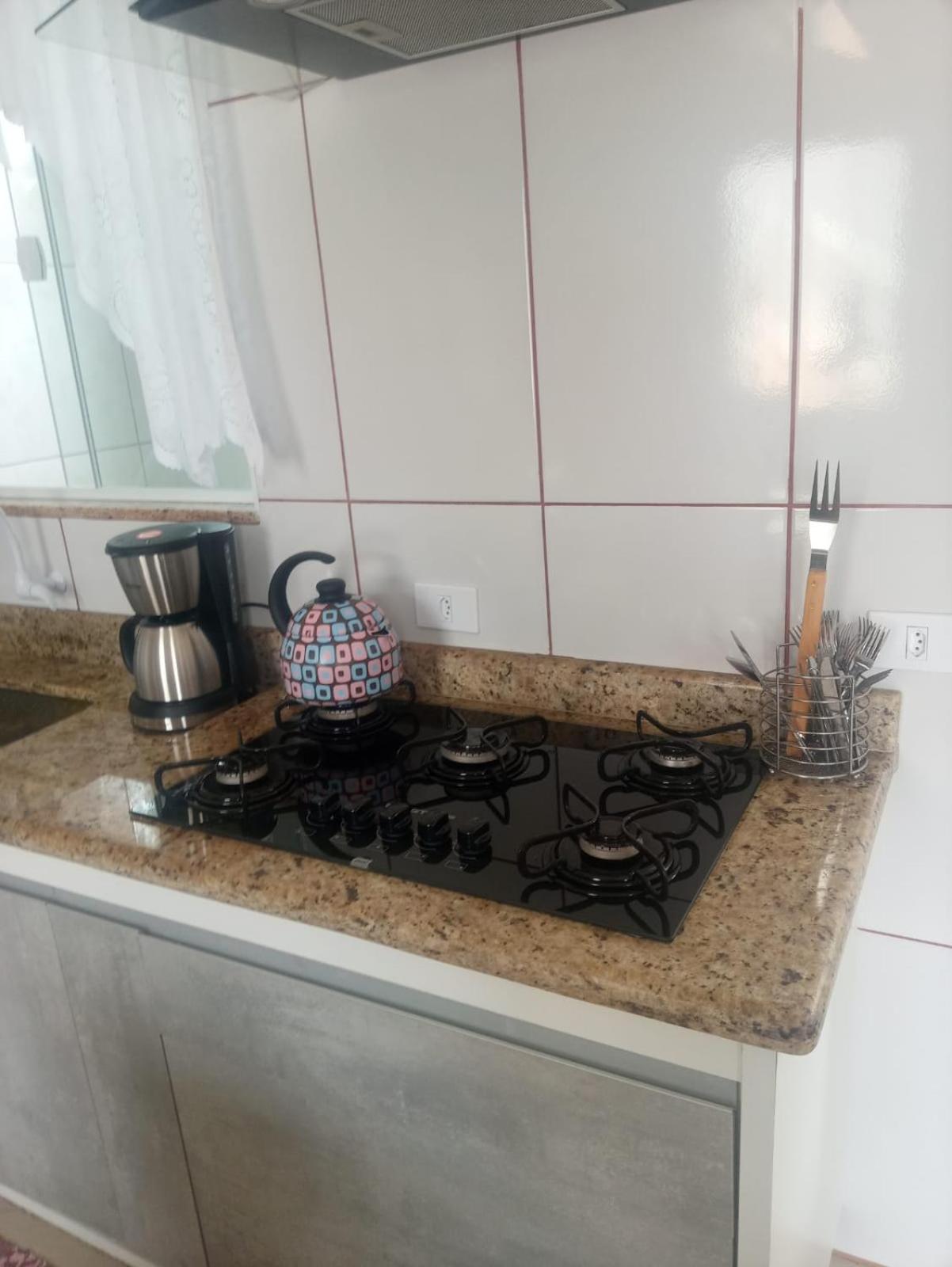 Casa de 4 suites com piscina, próxima a praias e do centro de Ubatuba