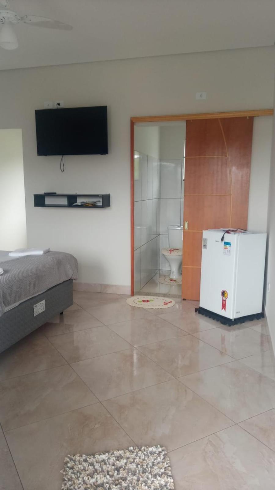 Casa de 4 suites com piscina, próxima a praias e do centro de Ubatuba