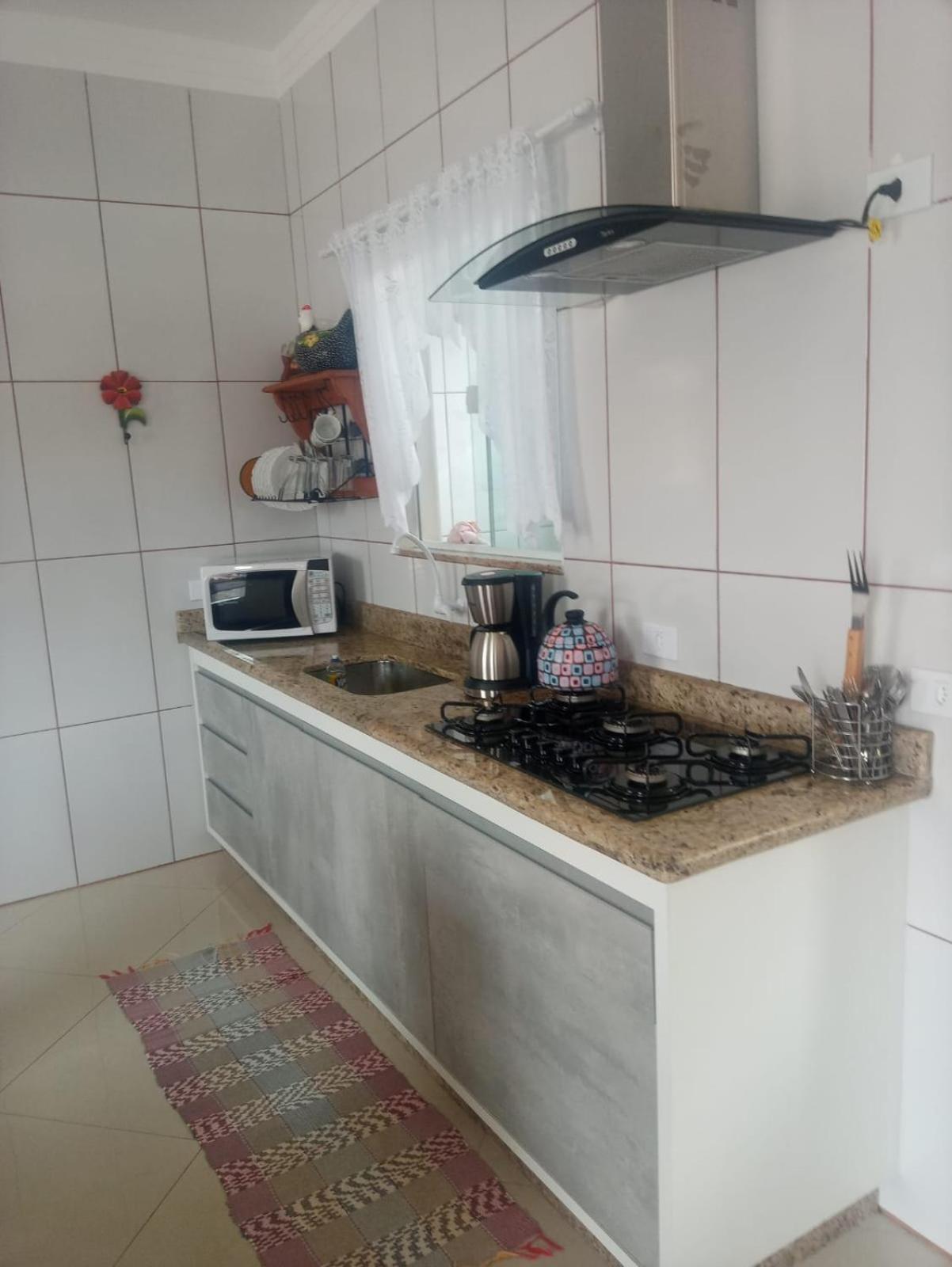 Casa de 4 suites com piscina, próxima a praias e do centro de Ubatuba