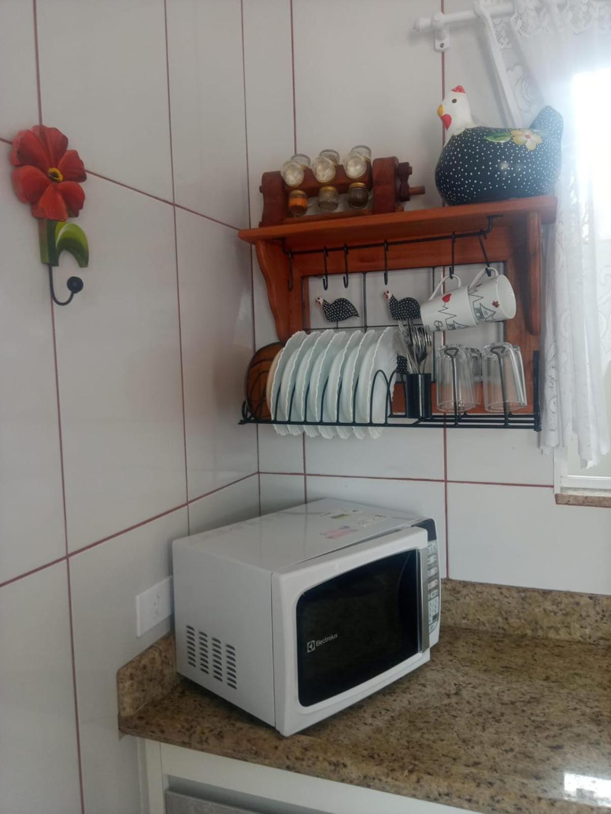 Casa de 4 suites com piscina, próxima a praias e do centro de Ubatuba