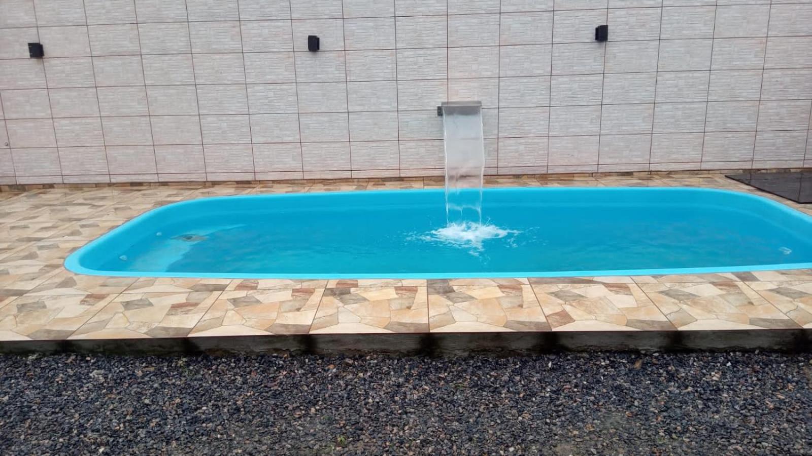 Casa de 4 suites com piscina, próxima a praias e do centro de Ubatuba