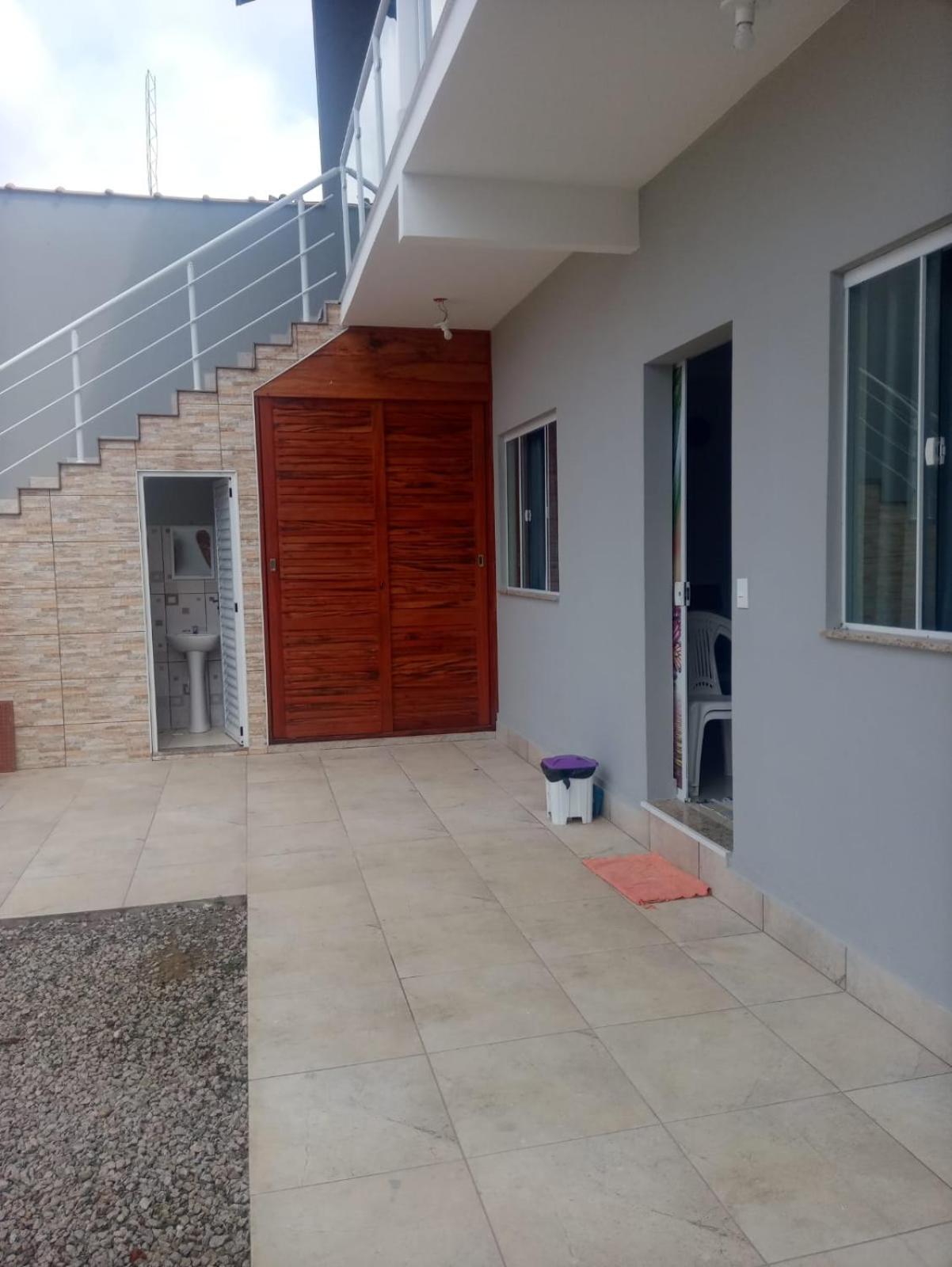 Casa de 4 suites com piscina, próxima a praias e do centro de Ubatuba